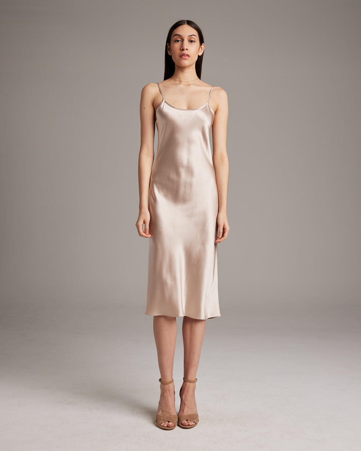 Blush Midi Slip Dress in silk charmeuse, elegantly draping on the body.