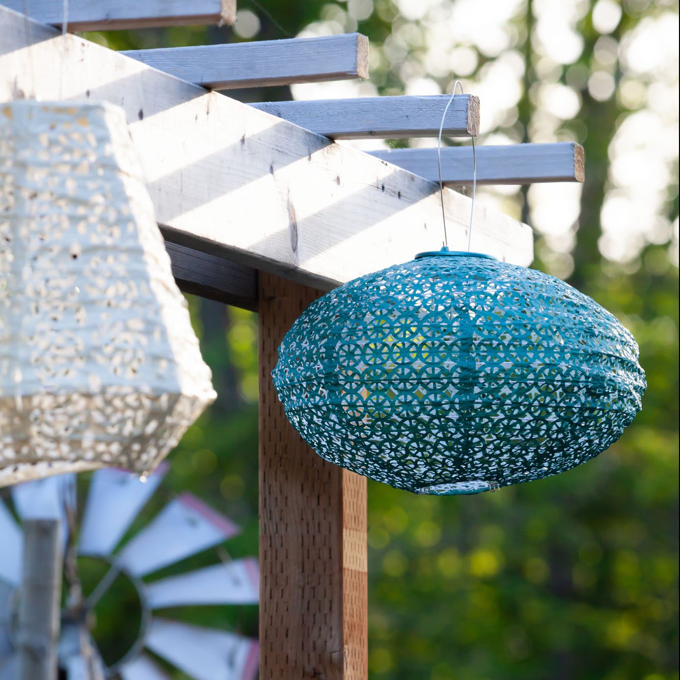 Soji Stella Oval Tyvek Solar Lantern in sunlight