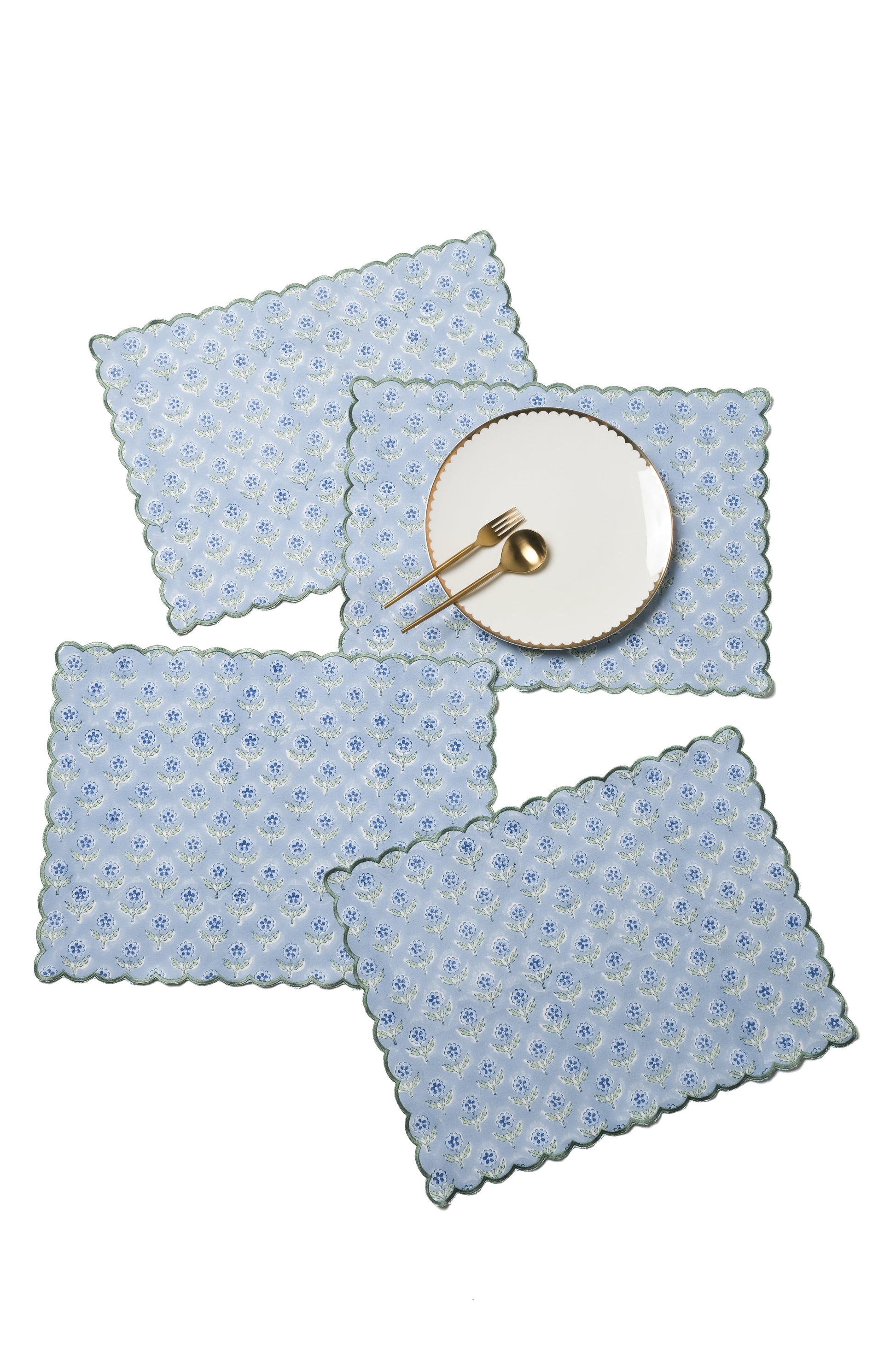 Blue scalloped embroidered blockprint placemats with plate from Inner Child