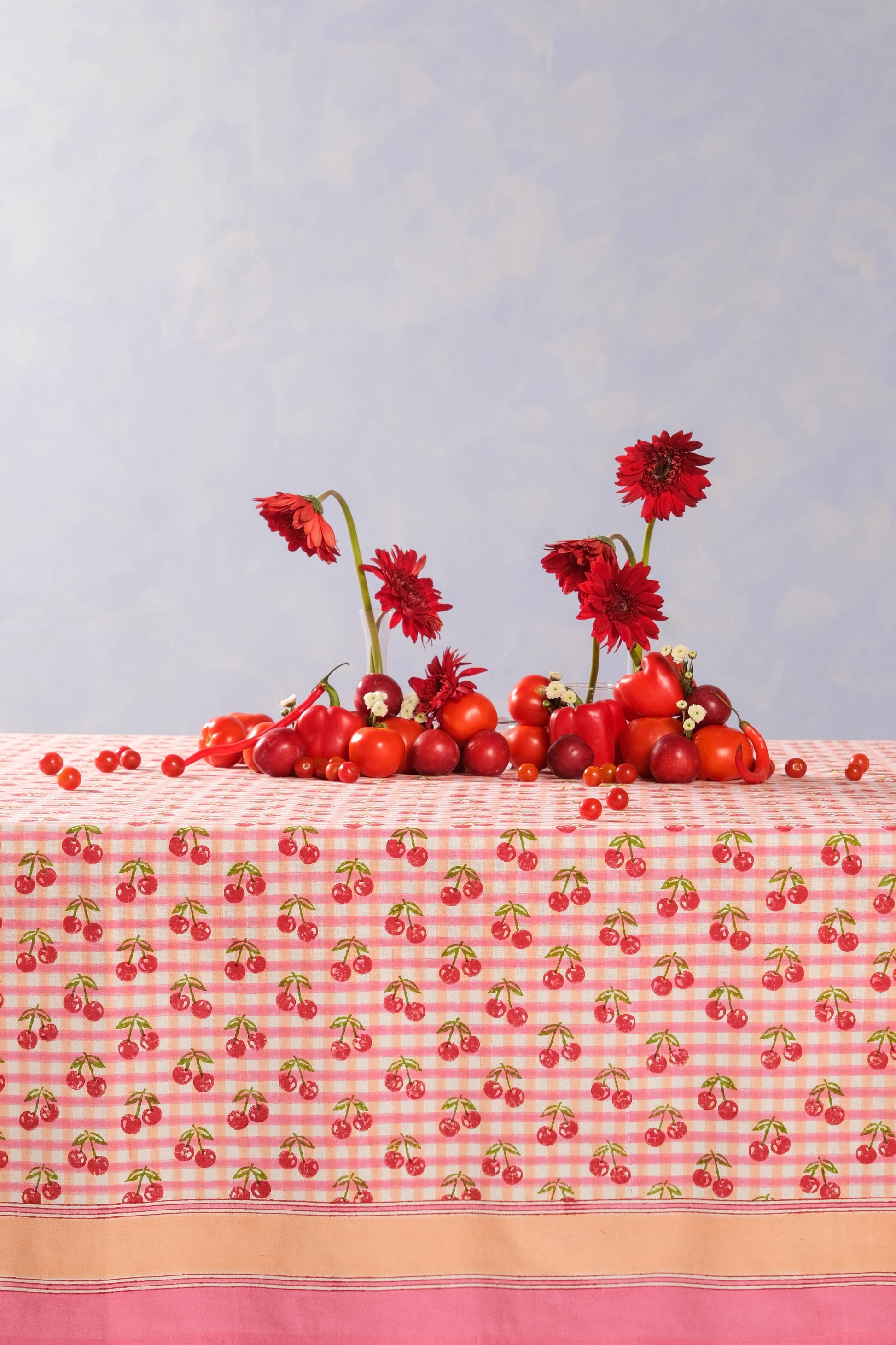 Inner Child cherry blockprint red gingham tablecloth with vibrant fruit display