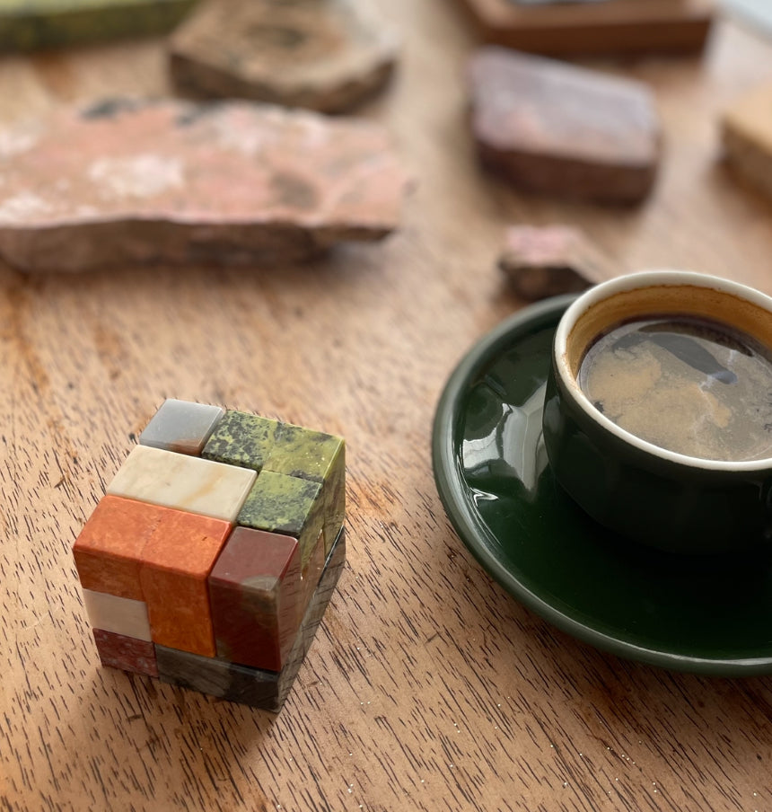 Solid stone Soma puzzle adding a touch of geometric elegance and calm to the decor.