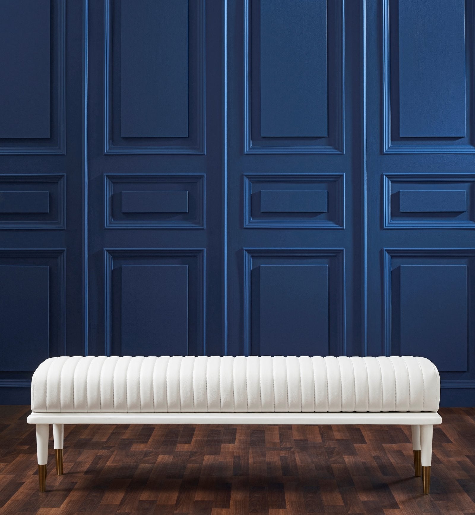 FN-5203-601618_3|Elegant white ribbed leather upholstered bench with modern gold-tipped legs. Luxurious living room furniture piece.