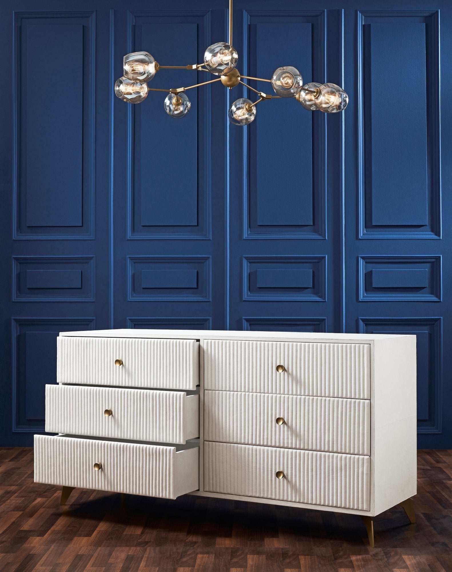 FN-5203-642033_4|White leather six-drawer dresser with ridged texture and gold pulls, some drawers open, luxury leather furniture.