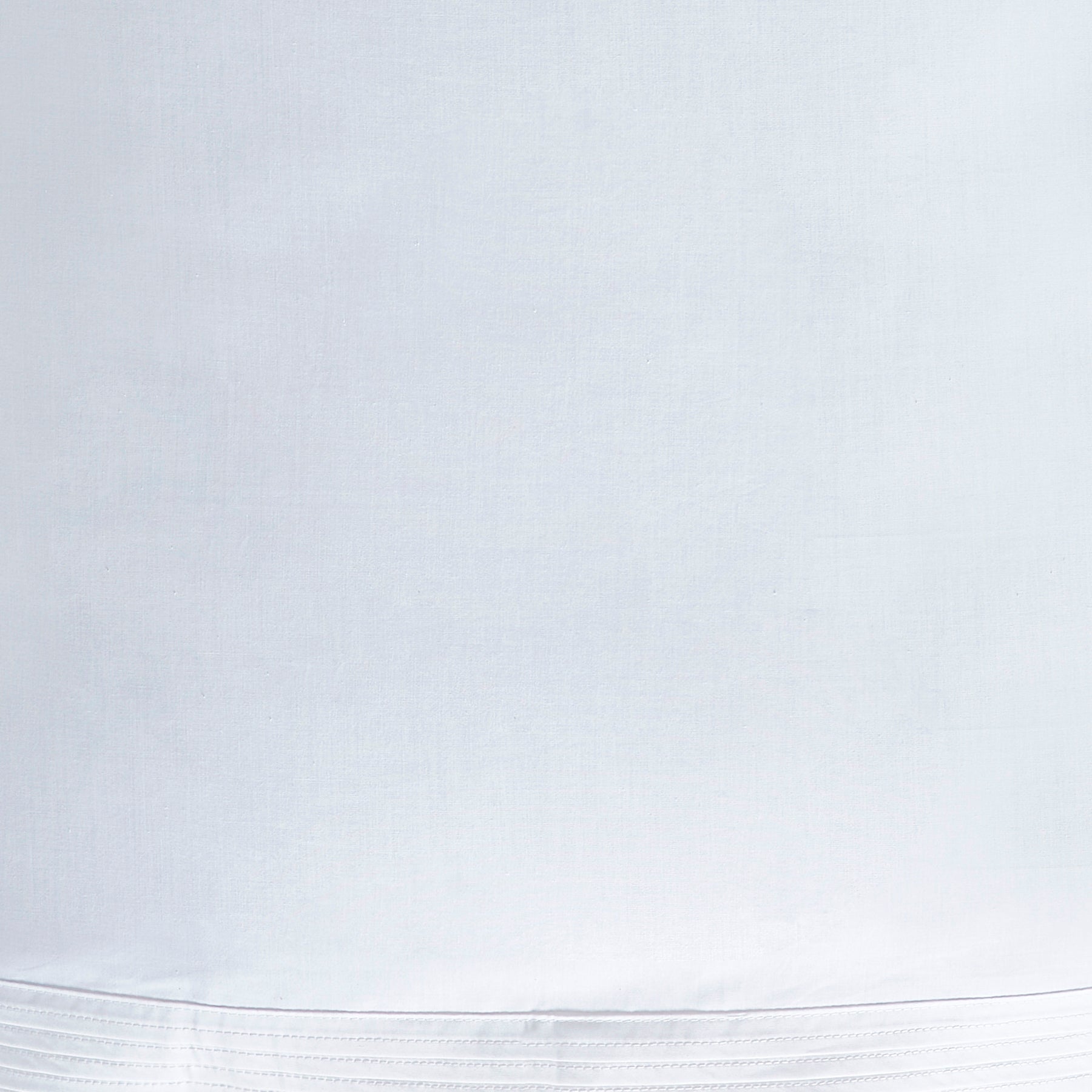 KSS-521-7880_7|Close-up of pristine white 100% cotton sheets showcasing elegant vertical pleat detailing on the hem.