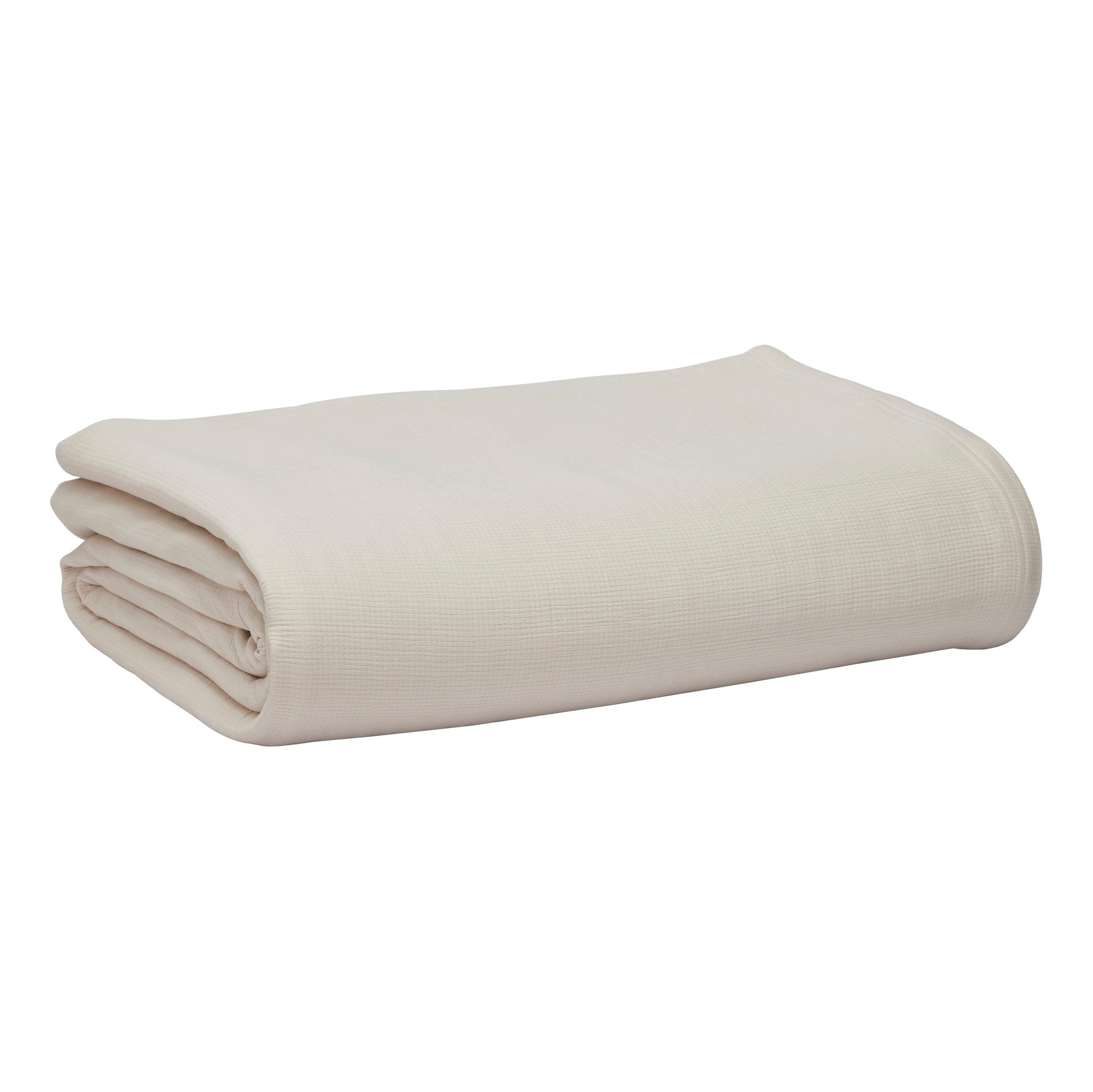 BL-860-11096_7|Tidily folded cream waffle weave blanket, offering comforting warmth and elegant texture for your bed or sofa. Versatile.