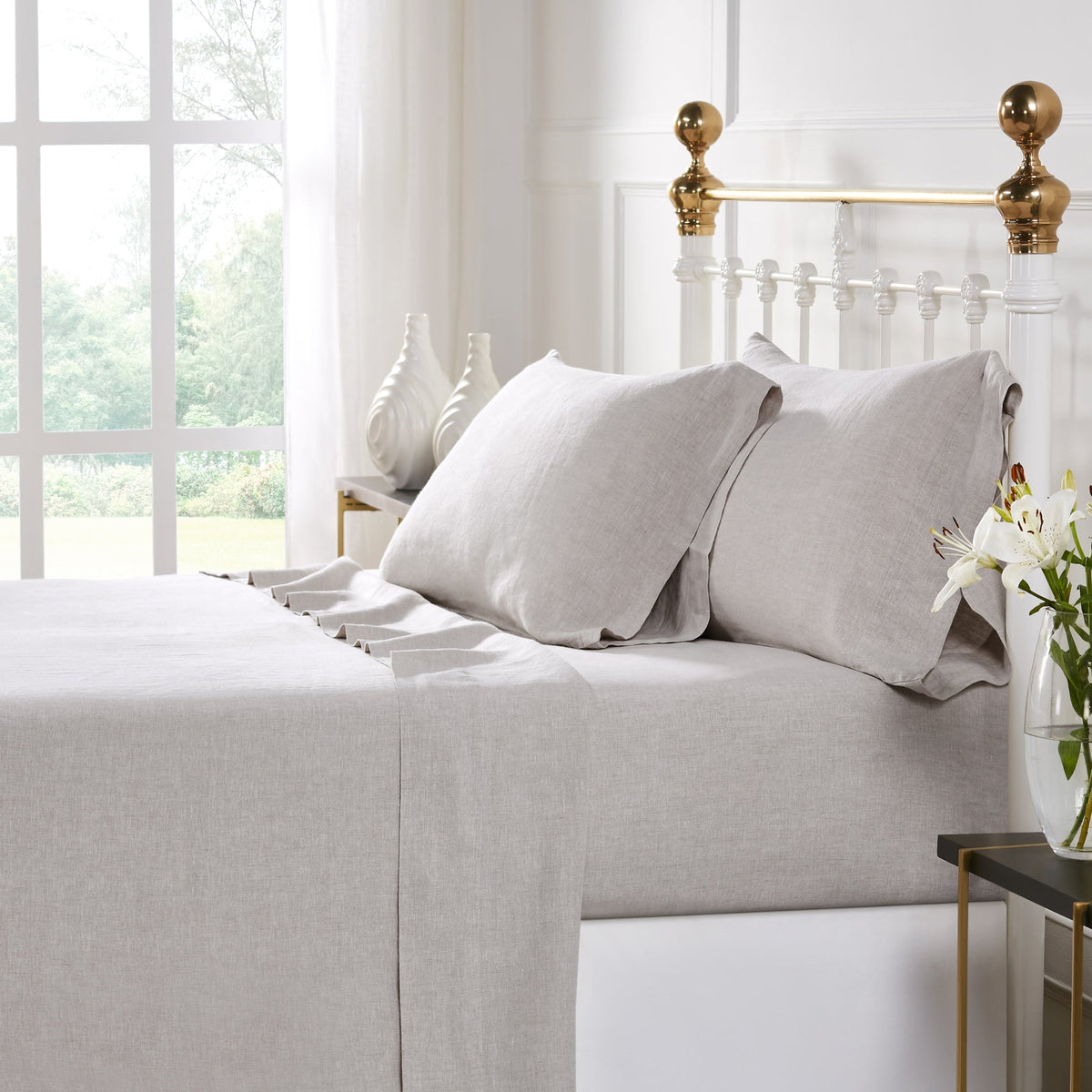 CSS-516-7284_5|Folded natural beige 100% linen sheets, offering a soft, breathable, and luxurious feel for comfortable, high-quality sleep.