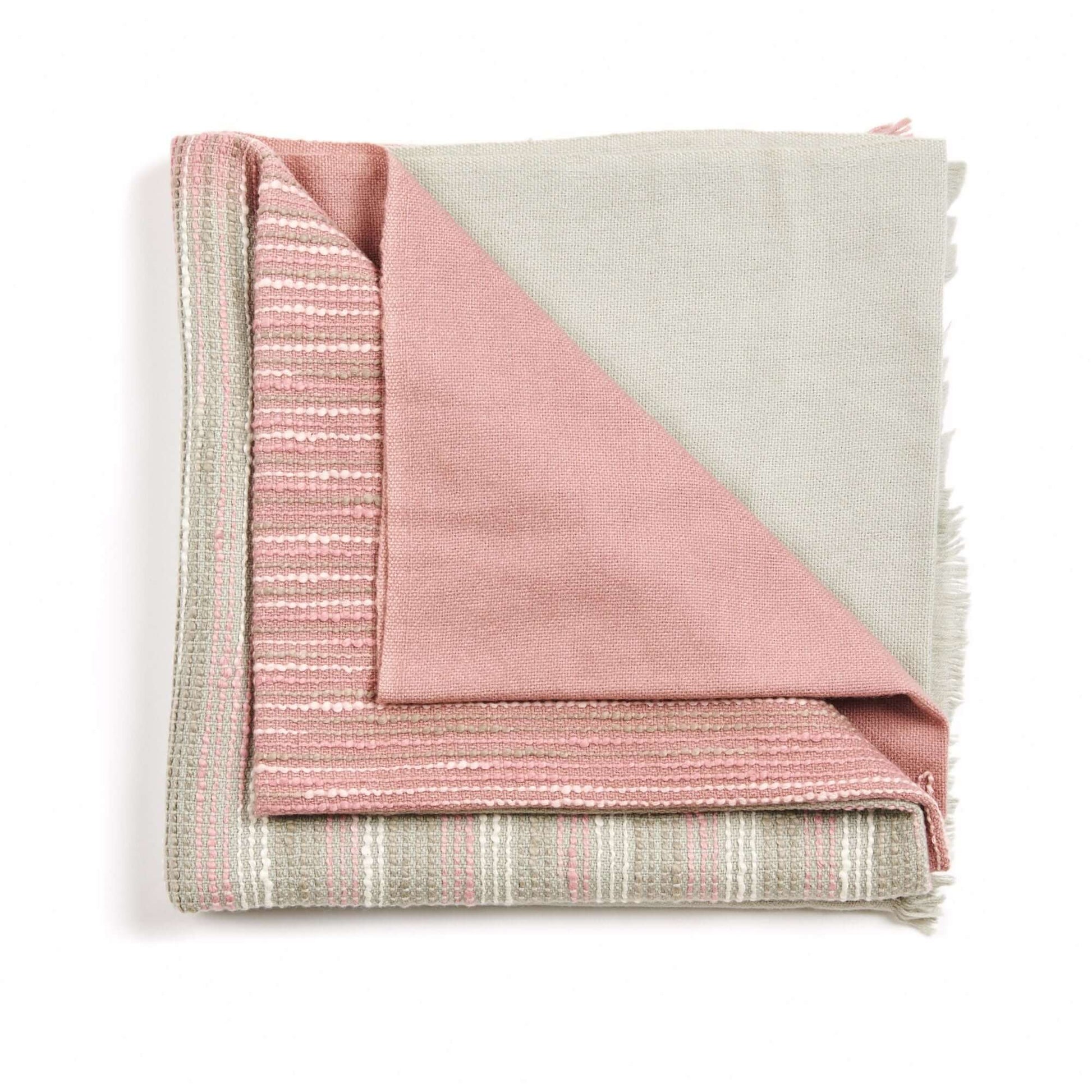 Chive Pink Green Ombre Handloom Merino Throw showcasing textured pink and green colors in a folded design.