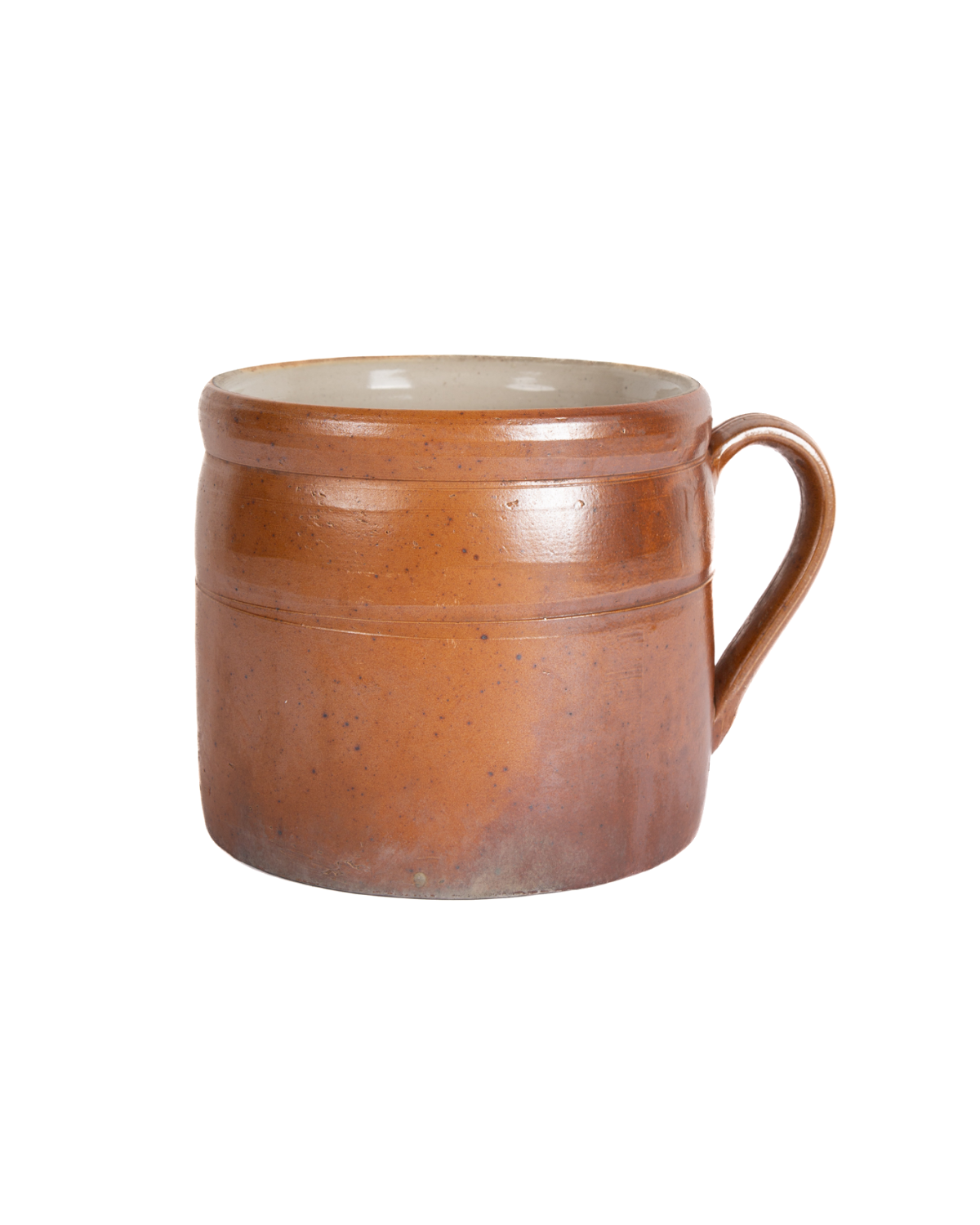 Brown ceramic mug with a white interior on a white background
