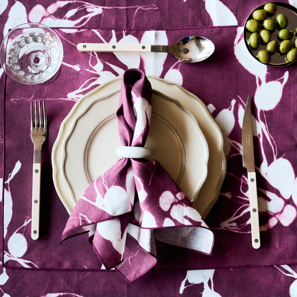 Porto Print Aubergine linen placemat 15x18 with hand-painted cascading floral pattern in deep aubergine - Goldie Home