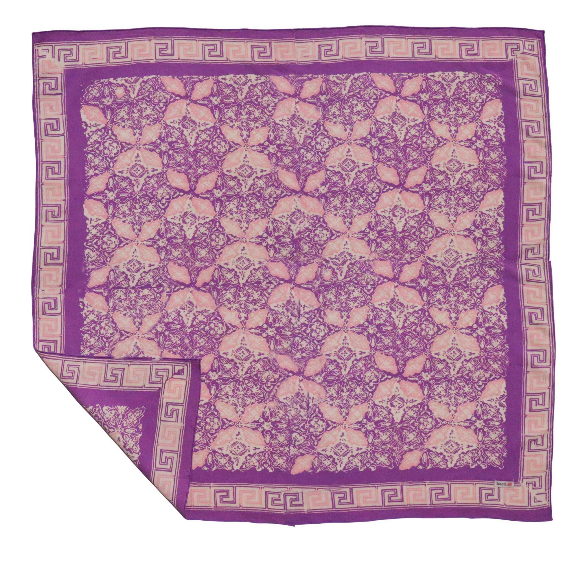 Purple and beige patterned bandana with a decorative border on a white background