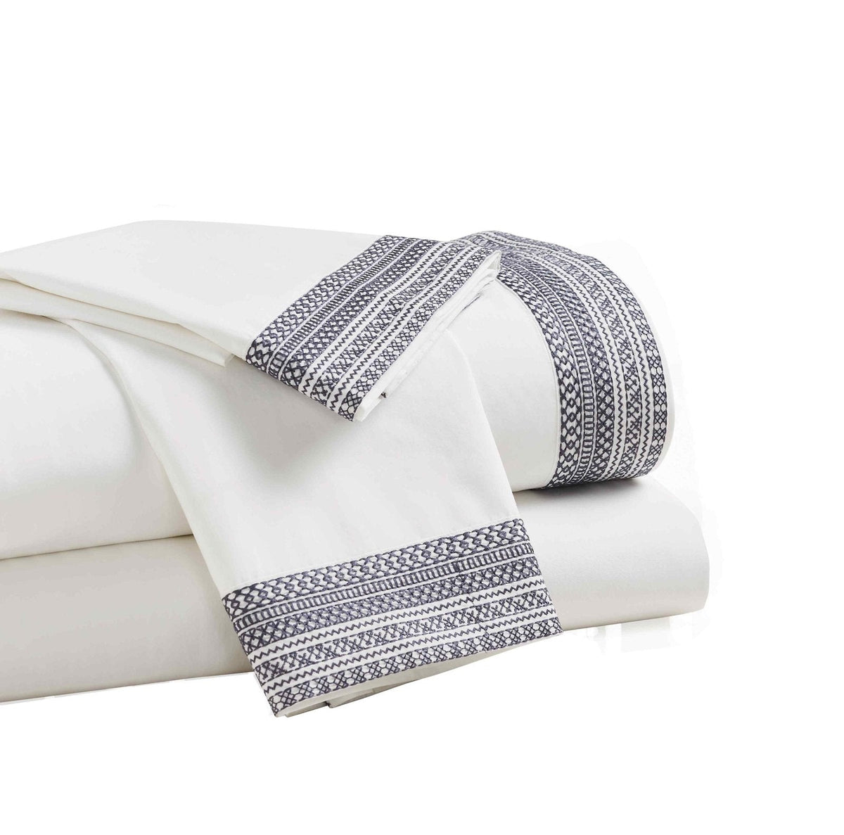 CSS-503-7284_3|Crisp white 100% cotton sheets elegantly folded, featuring a striking dark blue geometric embroidered border.