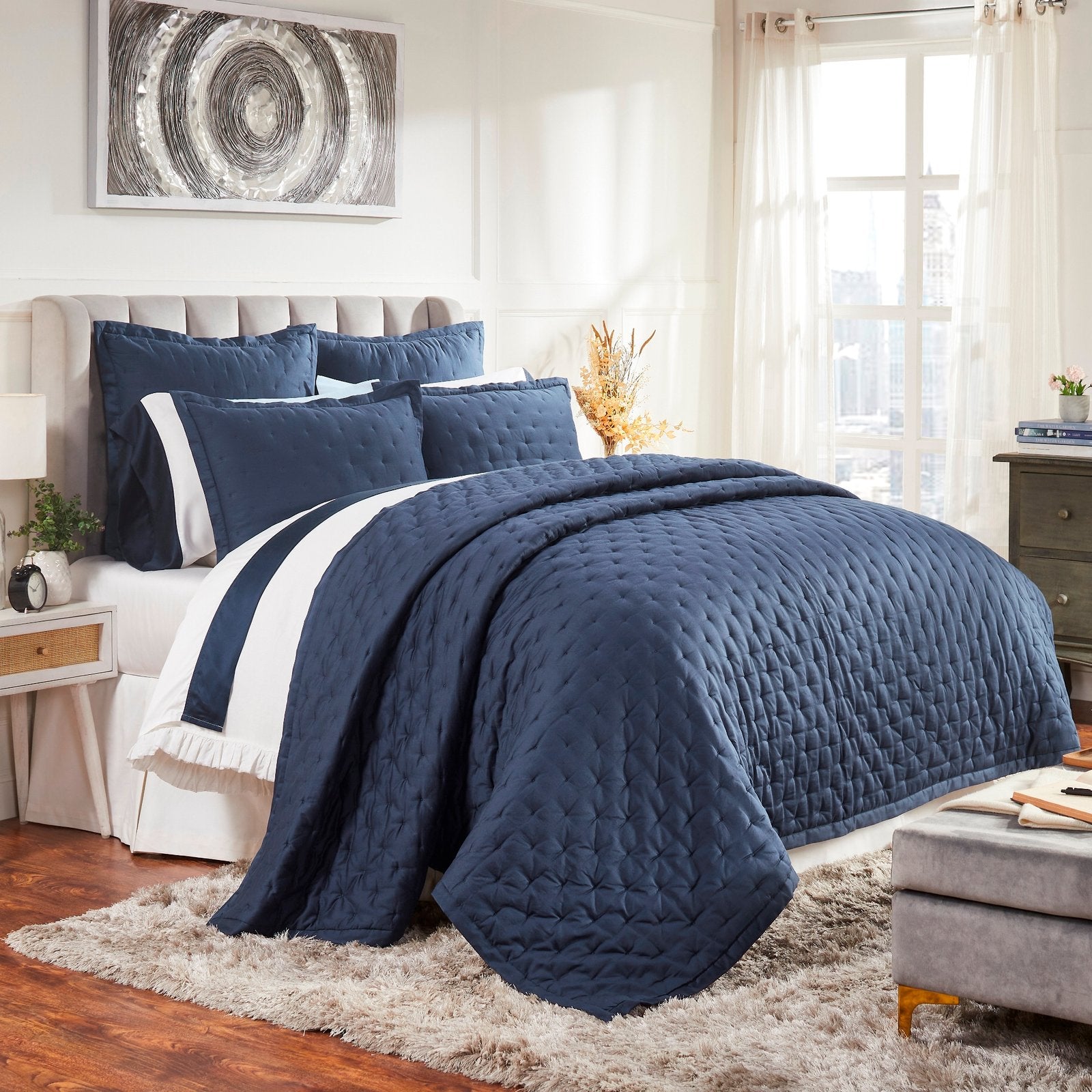 QT-357-9496_3|Elegant navy blue quilted bedding ensemble beautifully styled in a modern bedroom with coordinating pillows.