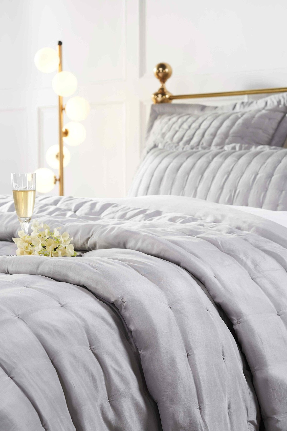 QT-333-9496_3|Luxurious light grey channel-quilted bedspread provides elegant comfort, perfect for a modern bedroom. Soft, stylish quilt.