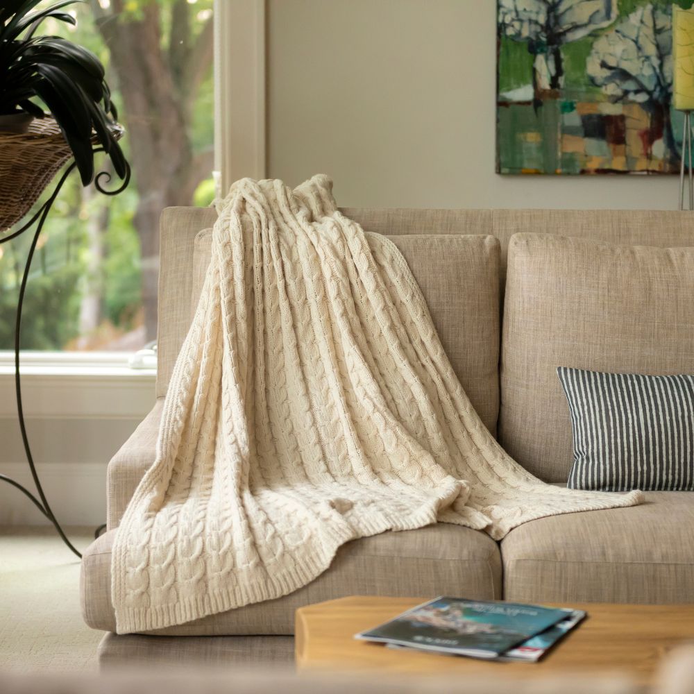 cream cable knit throw blanket