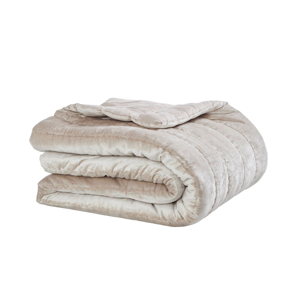 QT-339-9496_5|Beautifully folded champagne velvet channel-quilted quilt, highlighting its plush texture and inviting design for cozy warmth.