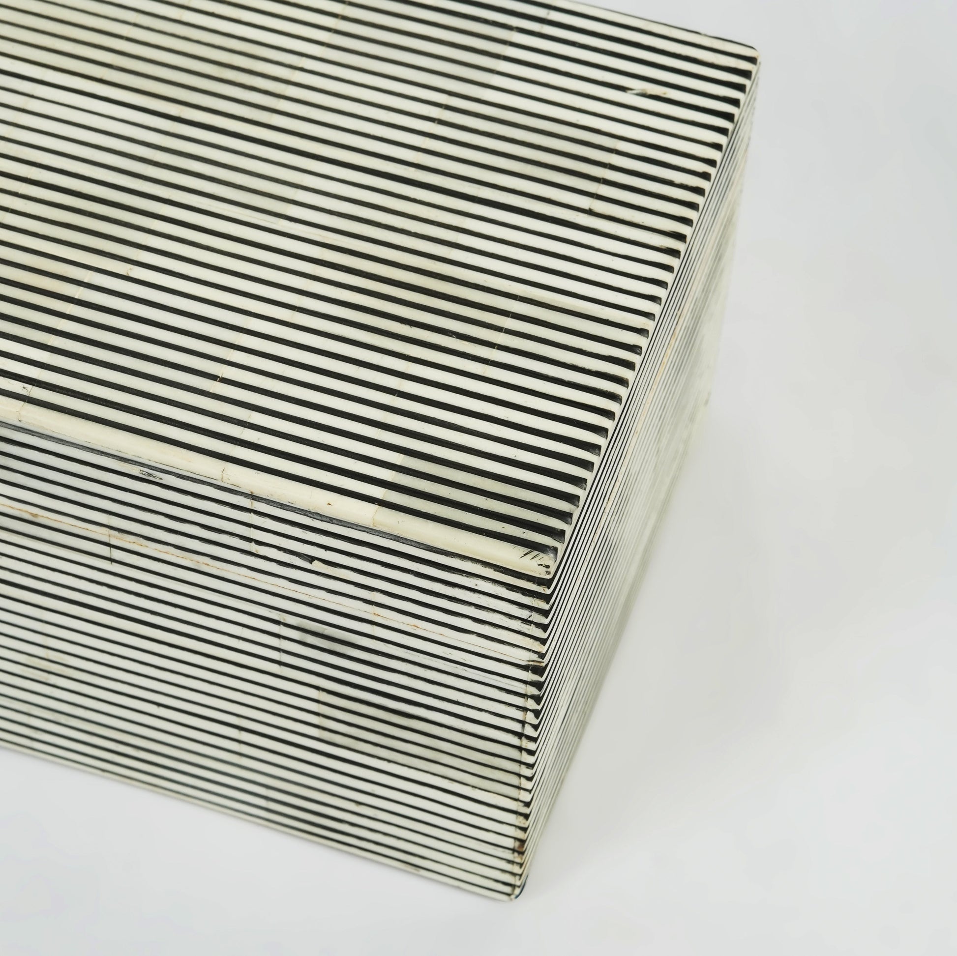 Close-up of fine pinstripe inlay and handcrafted finish