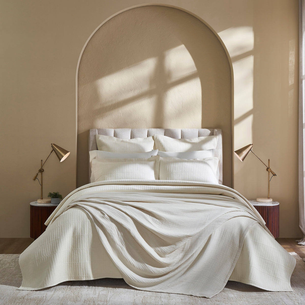 CL-271-11096_6|Luxurious cream textured coverlet, beautifully draped on a bed. Soft, inviting bedding for a comfortable and stylish bedroom.