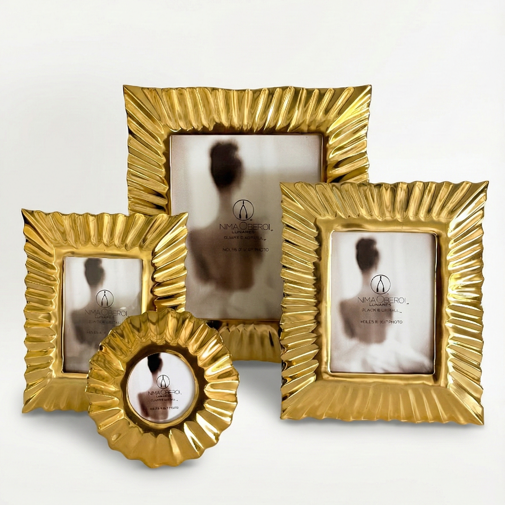 Set of gold picture frames on a white background