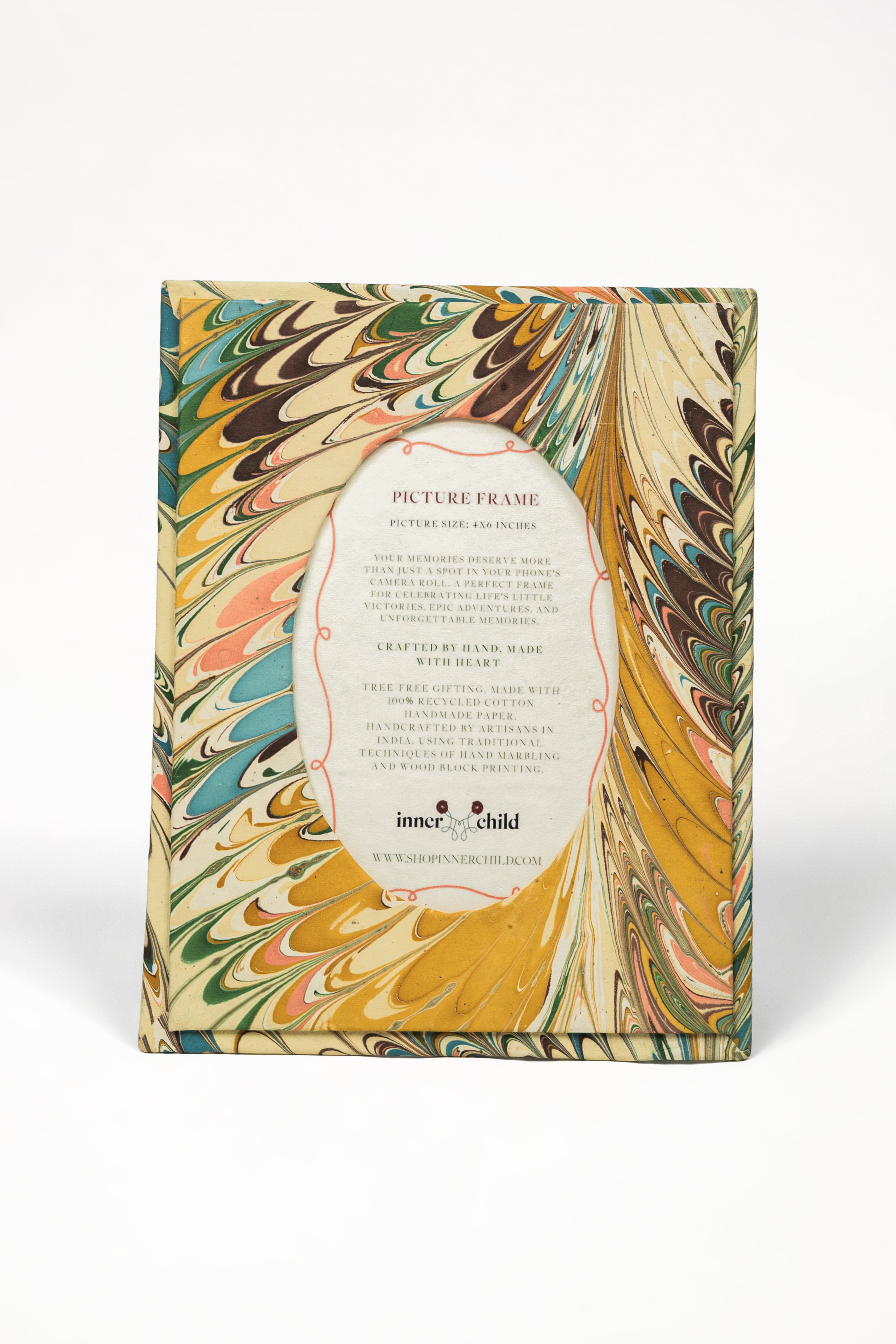Hand-marbled flatiron feathers picture frame with oval opening, 4x6 inches
