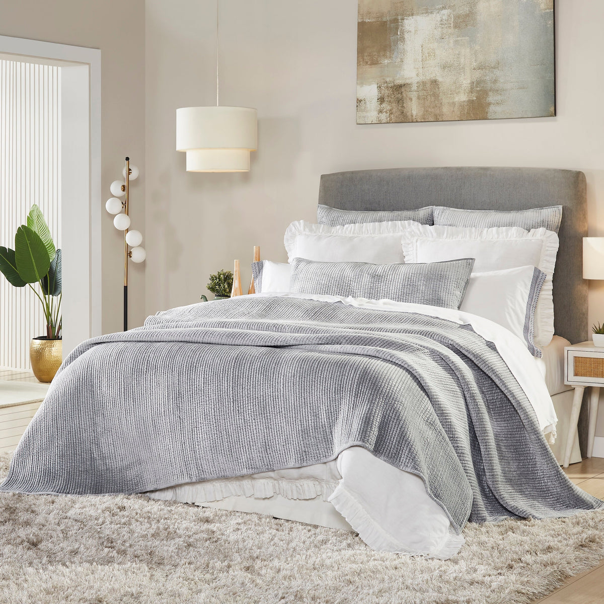 CL-157-11096_3|Pristine white textured coverlet drapes elegantly on a bed, providing a clean, luxurious, and inviting contemporary bedroom look.