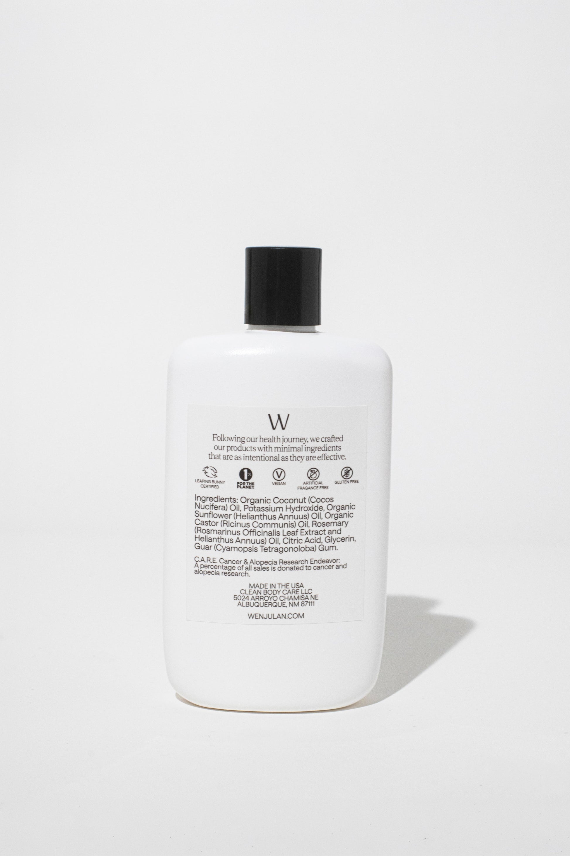 Wenjulan Whole Body Care Unscented Body Wash liquid soap bottle back with ingredient list, certifications and company information on white background