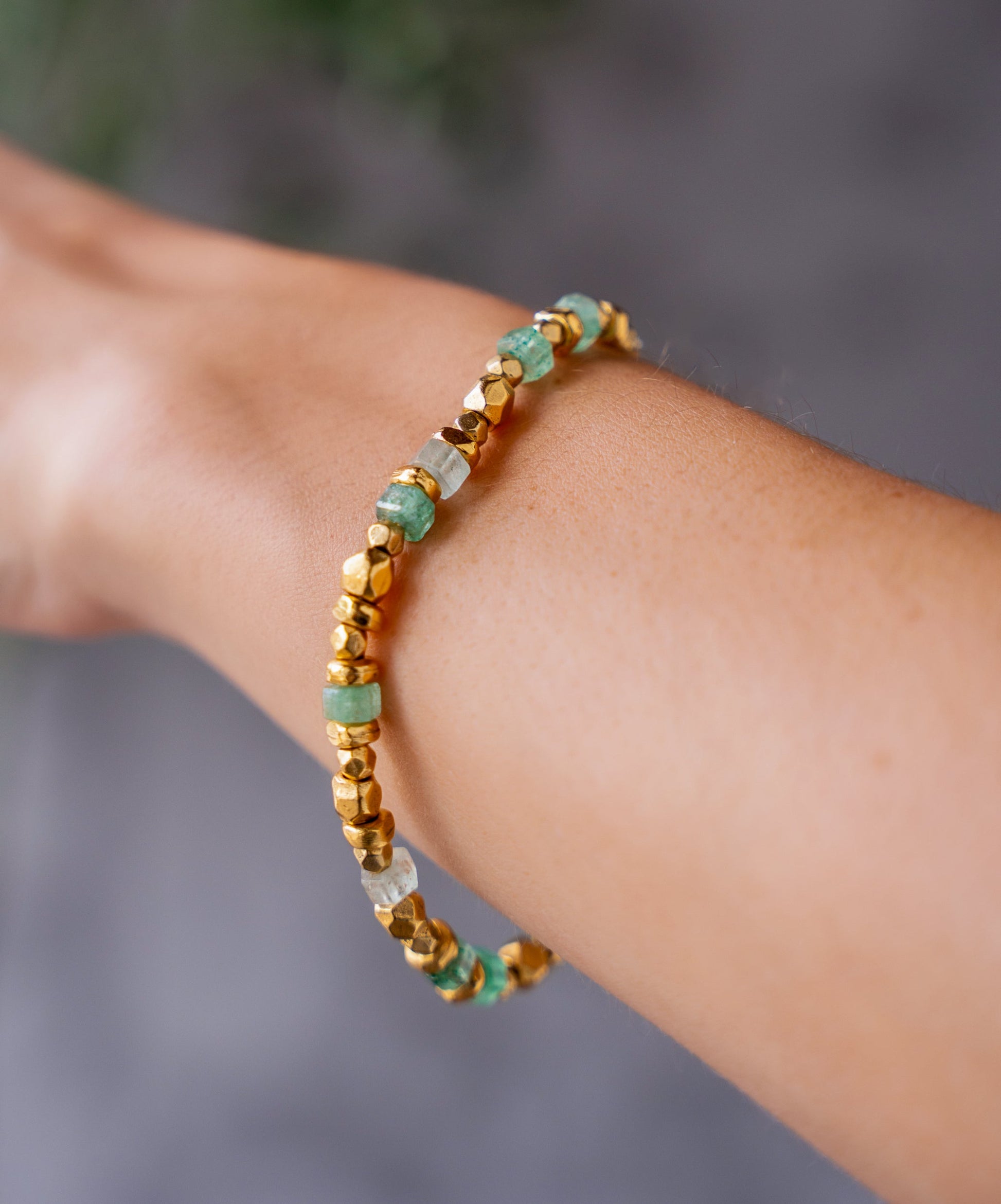 Green strawberry quartz and gold bead bracelet with textured organic gold beads and toggle clasp.