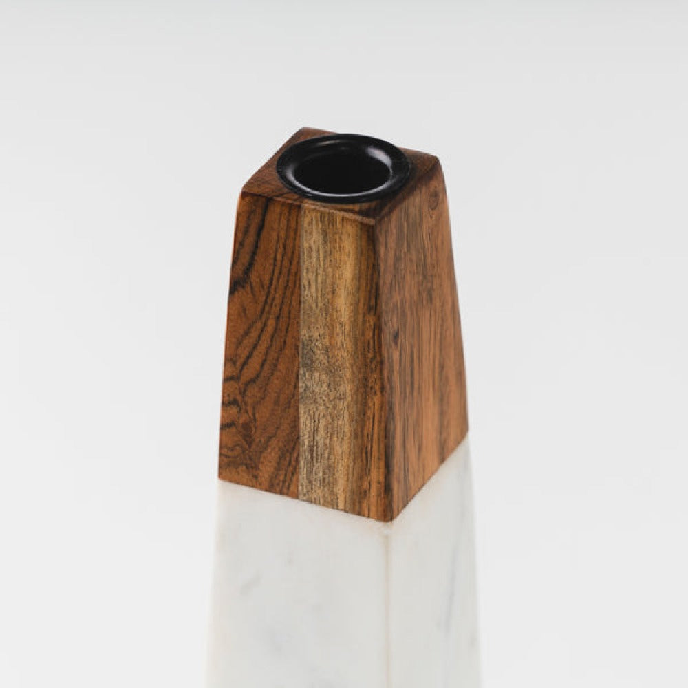 close-up of marble and wood contrast on candleholder
