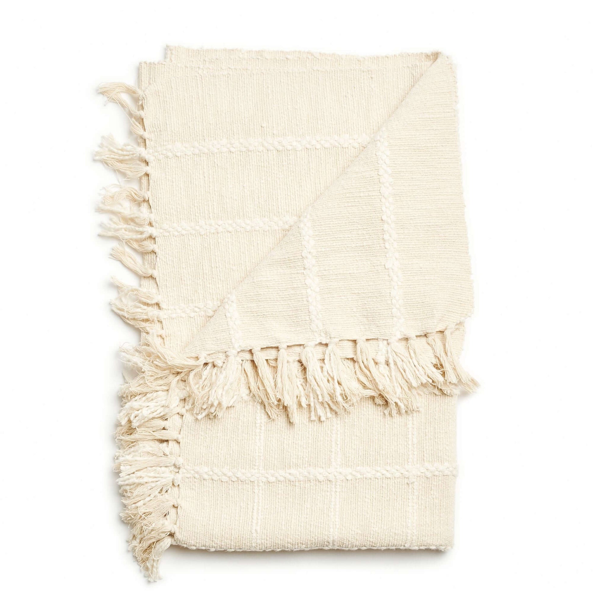 Sea Shell White Textured Checks Handloom Throw with subtle check patterns and hand-rolled fringes.