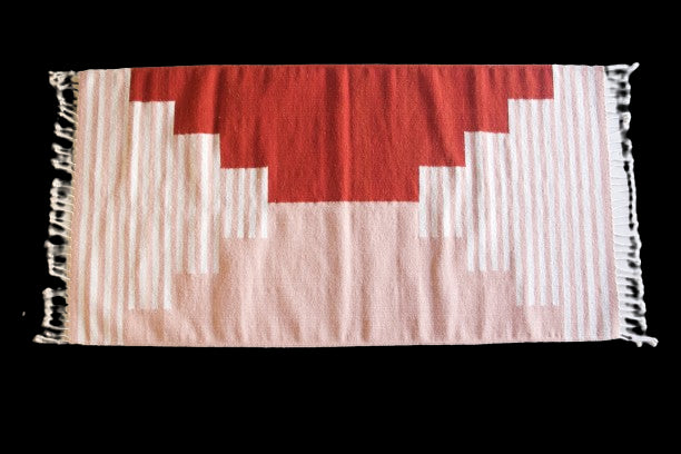 LOOM Imports handwoven ethical flat weave wool rugs. B Corp certified, women owned, fair trade, natural sustainable materials. 