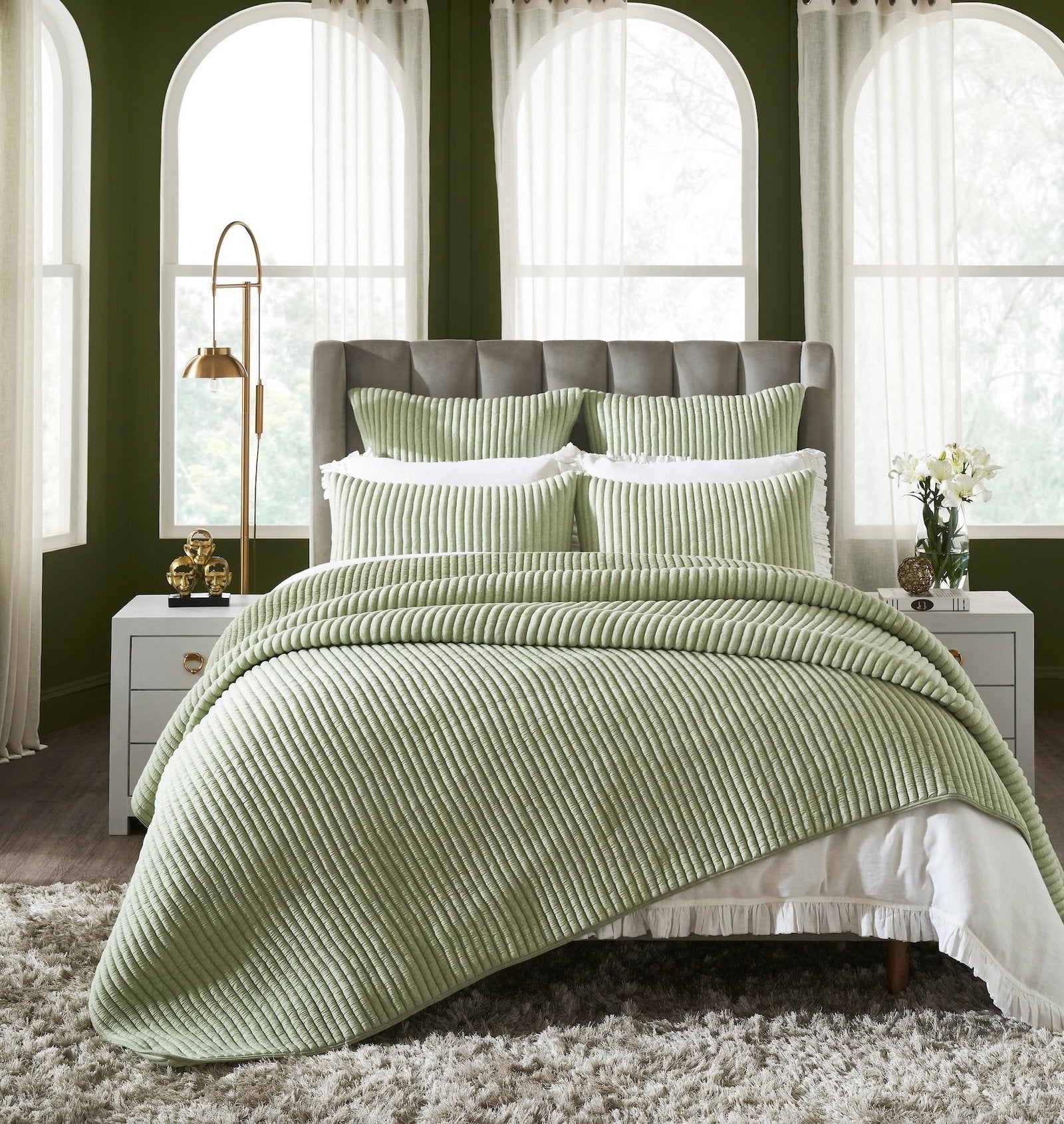 QT-370-11096_1|Vibrant sage green corduroy ribbed quilt with matching pillow shams, creating a cozy and inviting bedroom retreat.