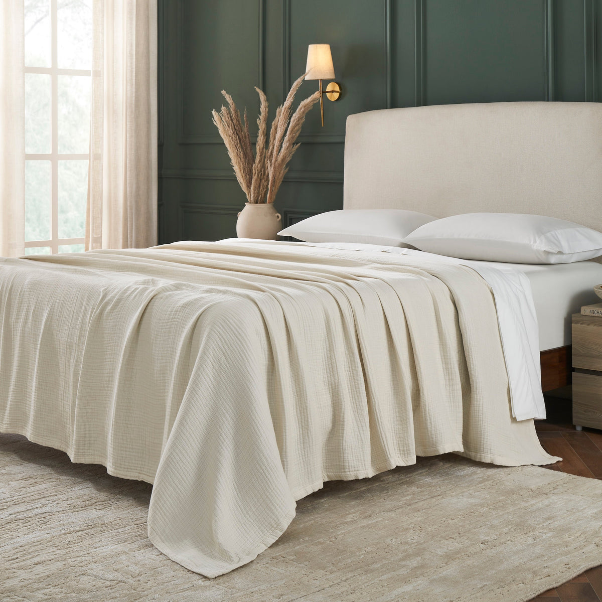 BL-862-11096_2|Cream textured cotton blanket elegantly spread across a queen-sized bed, offering full coverage and a cozy, neutral aesthetic.