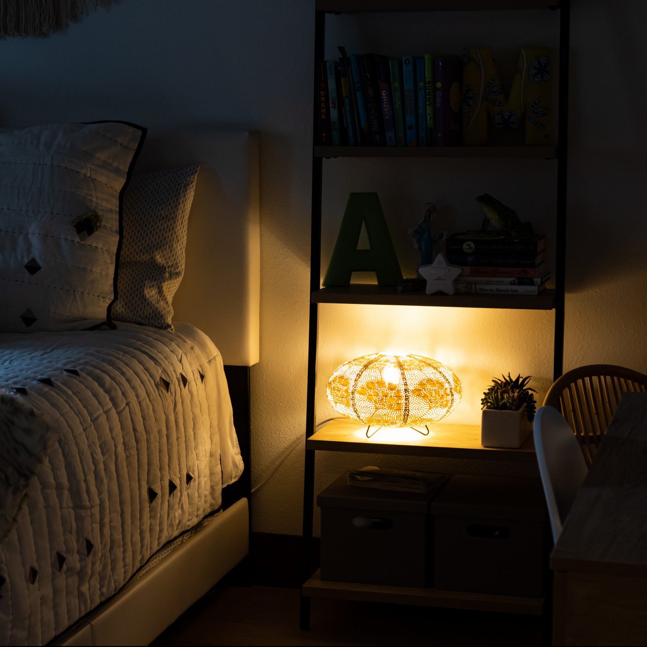 Soji Stella Solace Tyvek Indoor Table Lamp on bookshelf