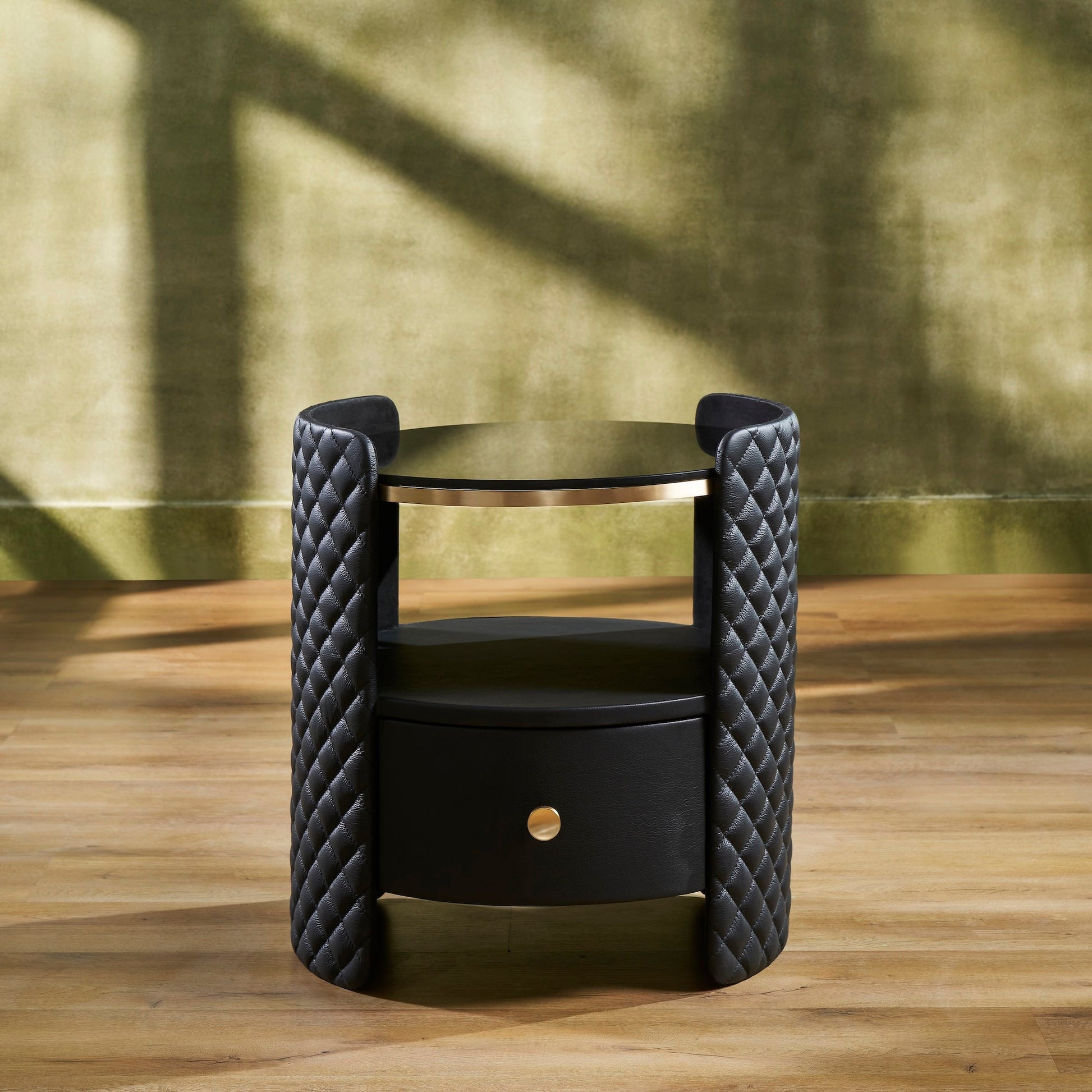 FN-5215-202022_1|Elegant black quilted leather nightstand with gold accents, a luxurious and modern side table for sophisticated bedroom decor.