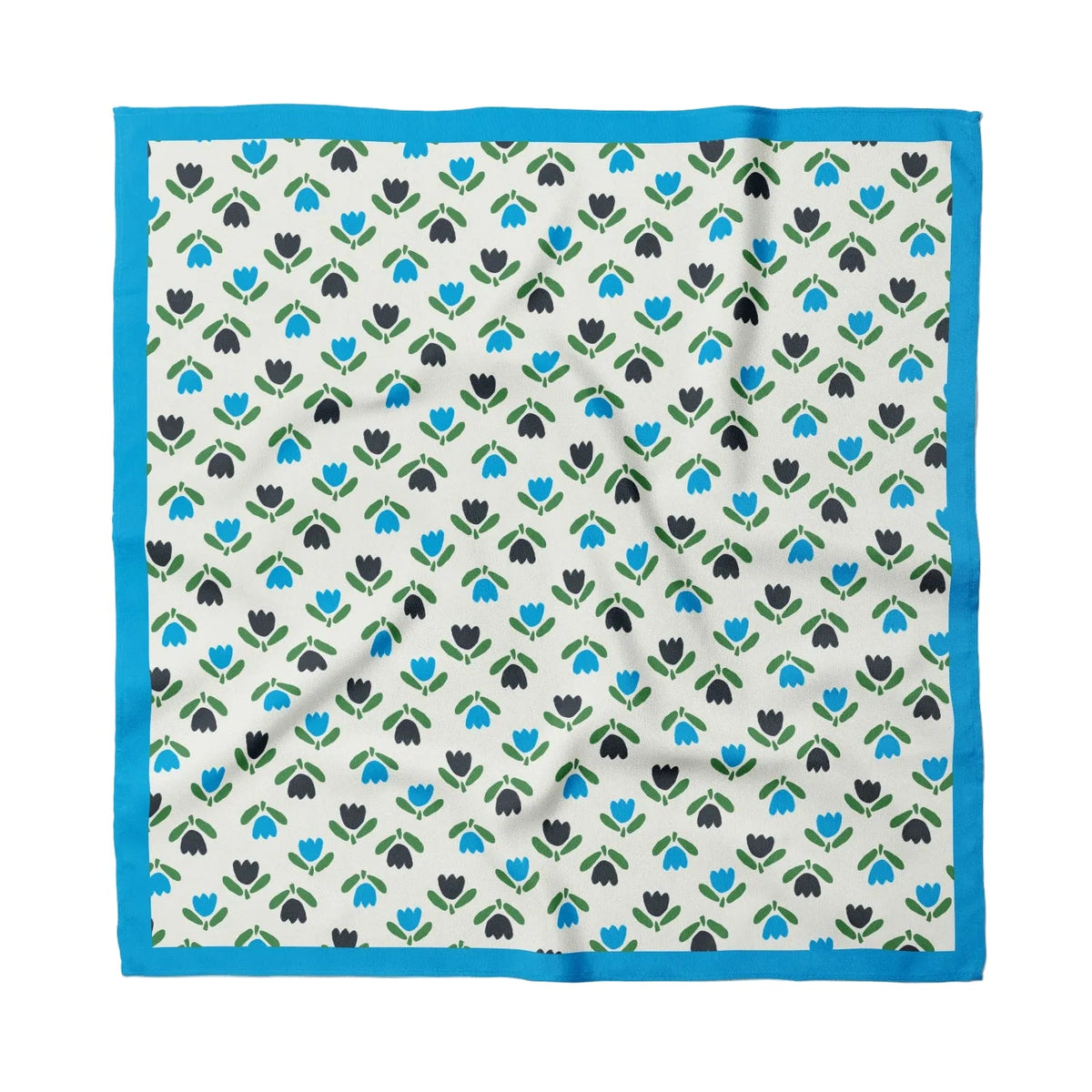 Patterned handkerchief with blue border on a white background, and black and blue tulips pattern