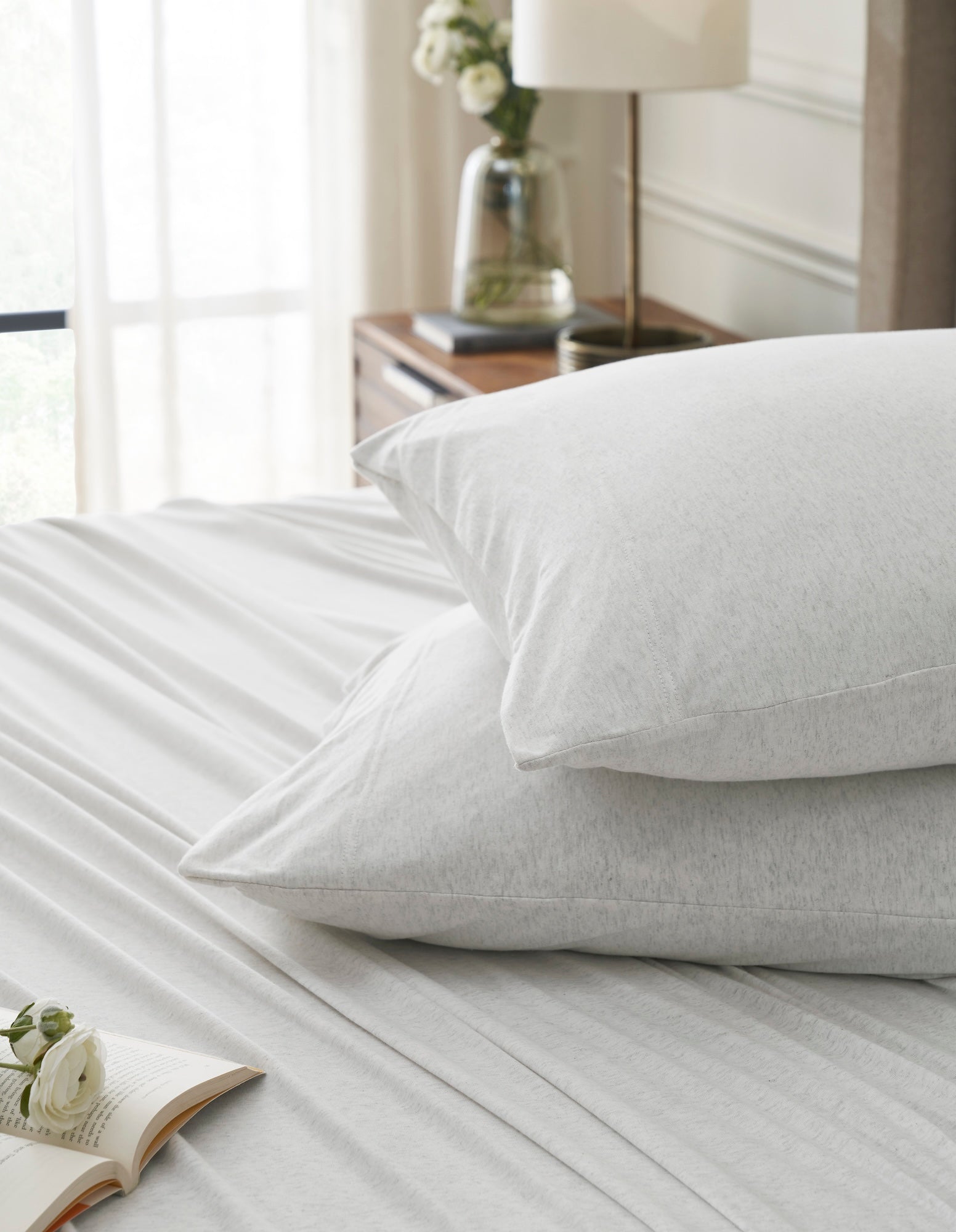 KSS-525-7880_4|Close-up of soft, cozy heather grey 100% cotton jersey sheets and pillowcases, highlighting the breathable, relaxed texture.