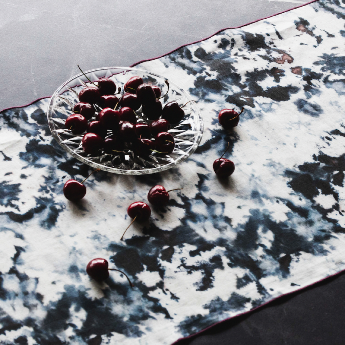 Grey Marble linen table runner close up of maroon trim detail - Goldie Home