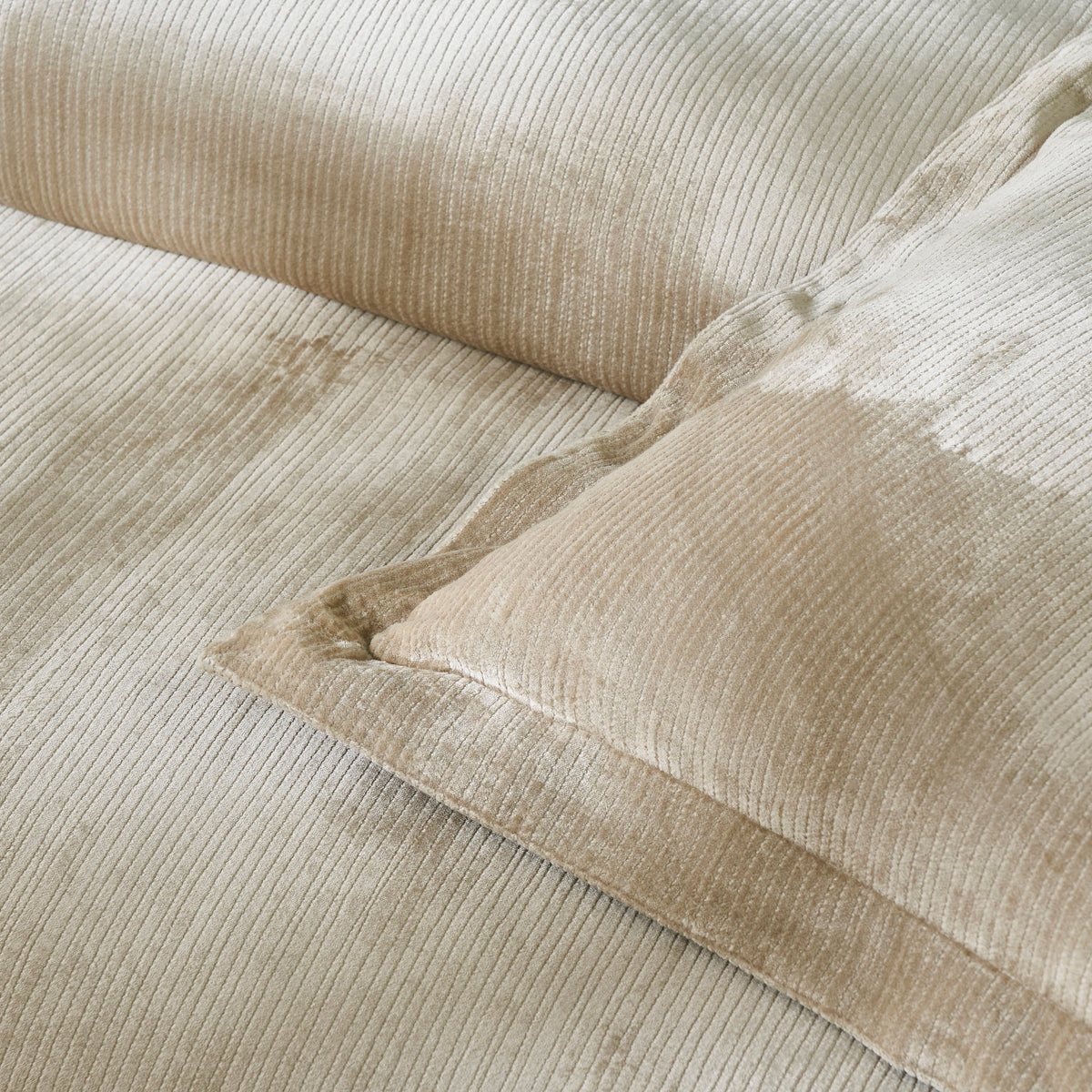 ES-053-2626_3|Close-up of a luxurious beige velvet ribbed duvet cover and matching sham, showcasing plush texture and quality.