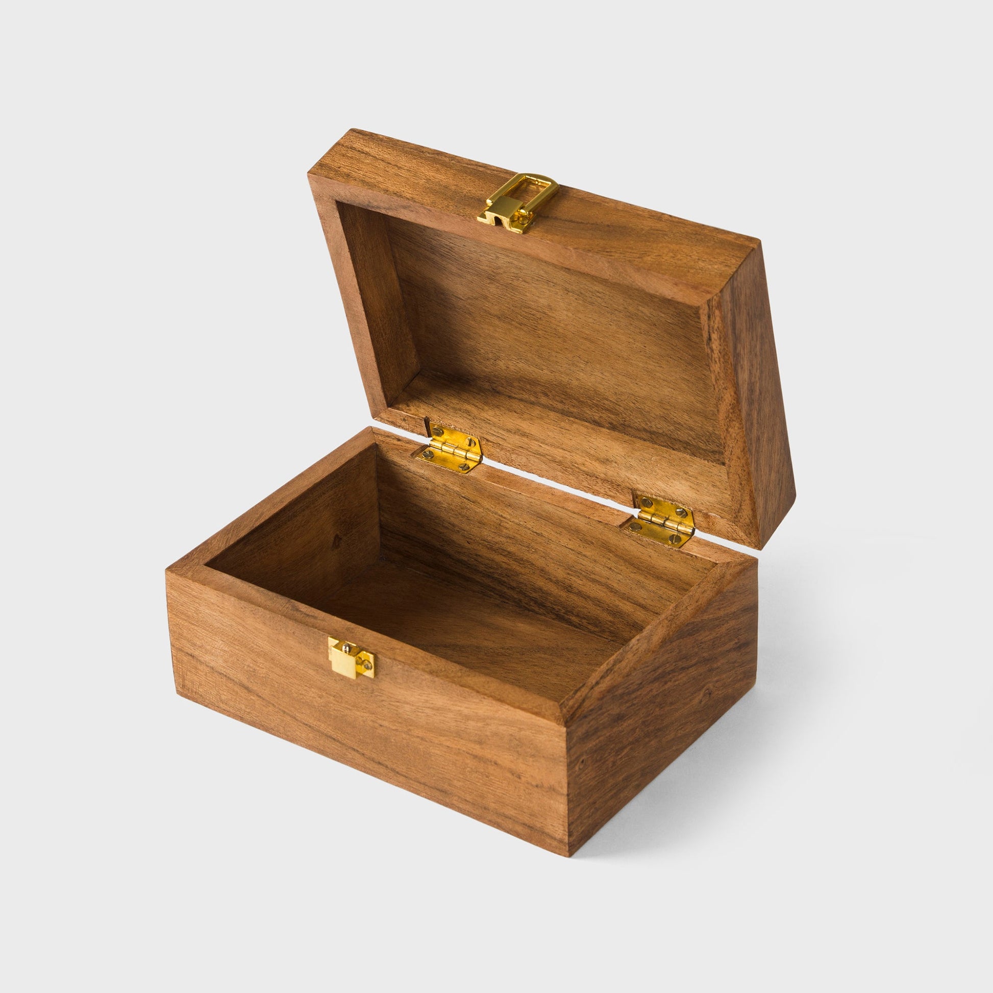 close-up of natural acacia wood grain and latch on handcrafted keepsake box
