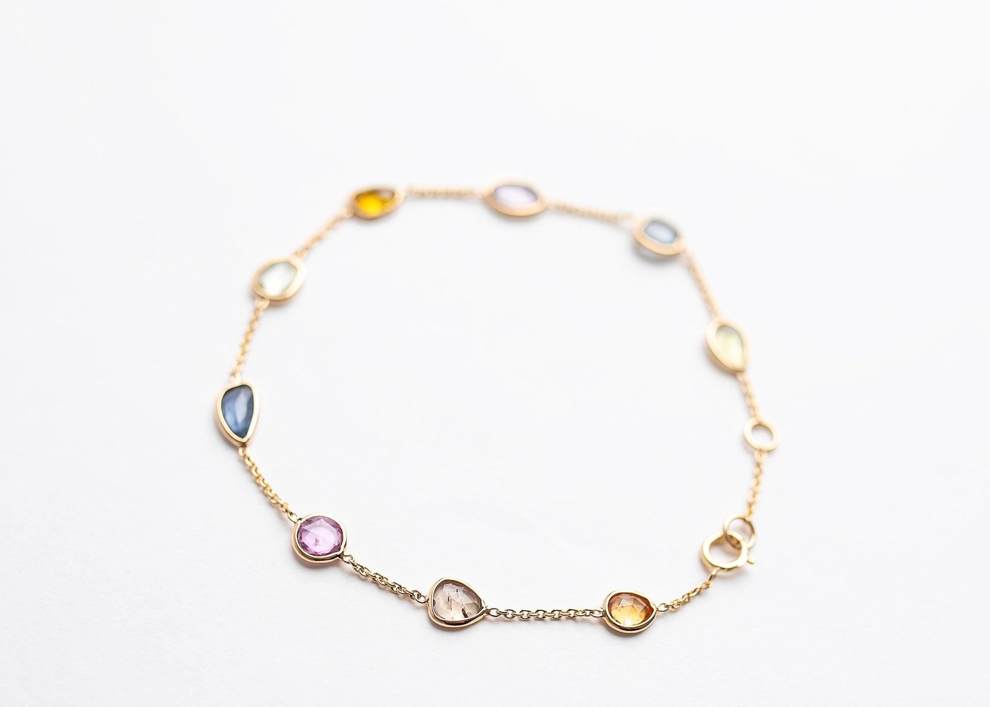 Rainbow Radiance minimal everyday fine jewelry in solid gold and sterling 925 silver with natural gemstones.