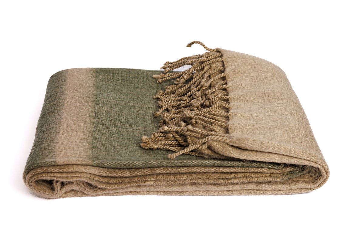 olive and tan throw blanket with fringe folded