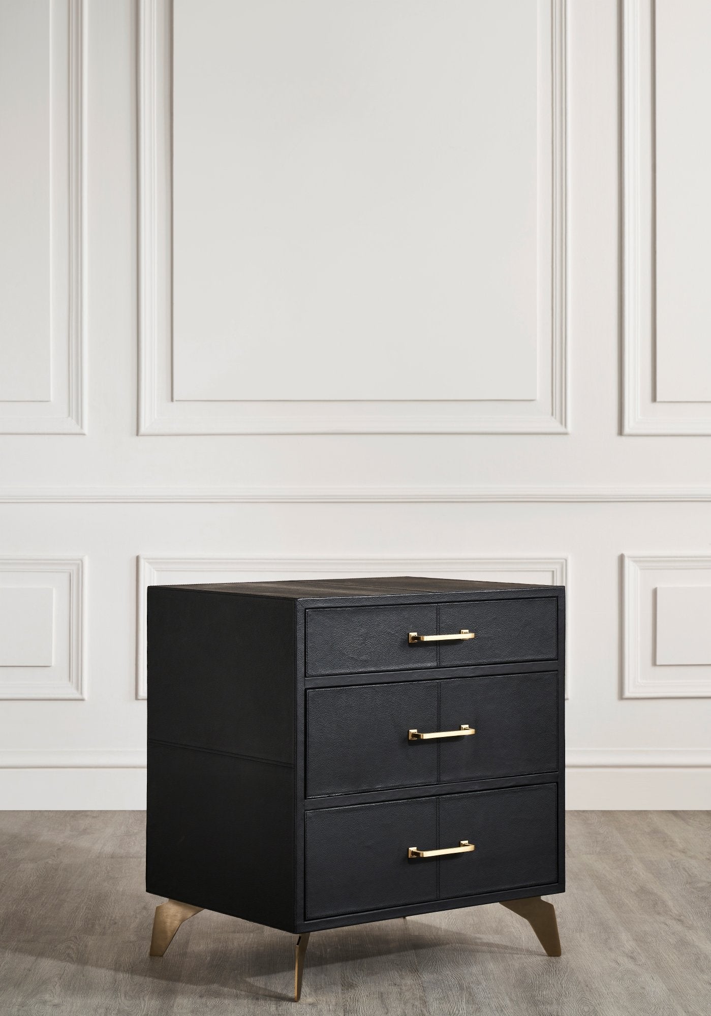 FN-5200-262028_3|Black leather furniture dresser with three drawers, gold handles, and tapered brass legs, a sophisticated storage solution.