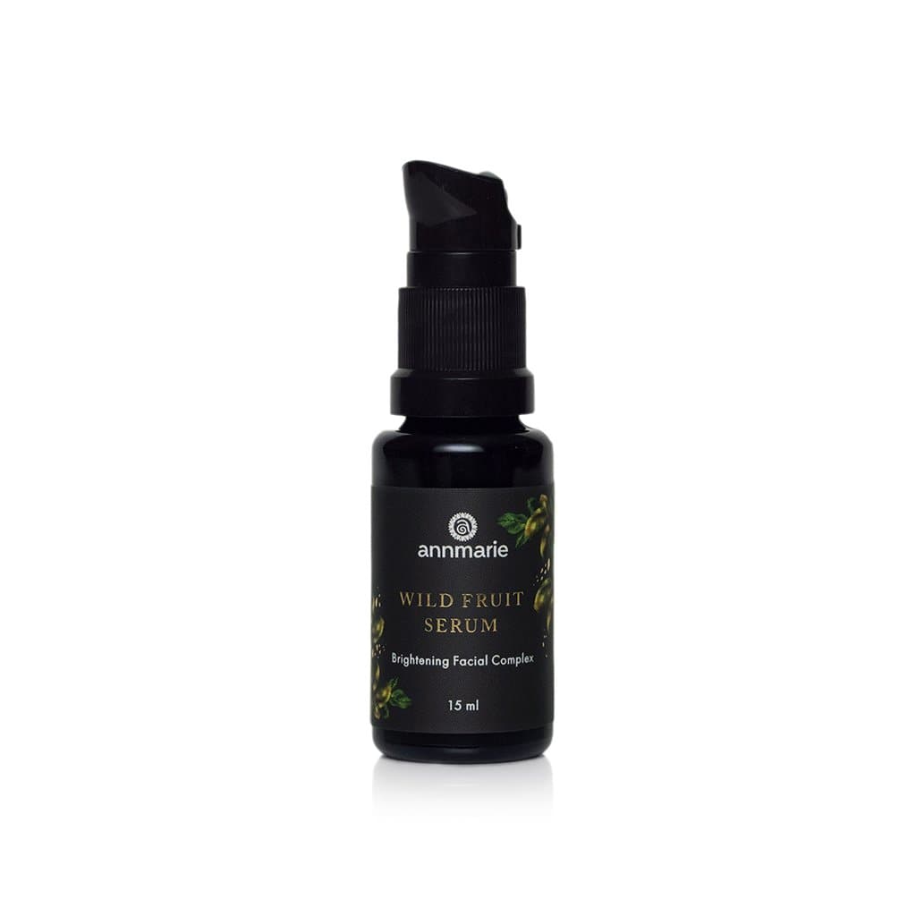Wild Fruit Serum brightening facial complex in black glass pump bottle, 15 ml facial serum for glowing, radiant skin.