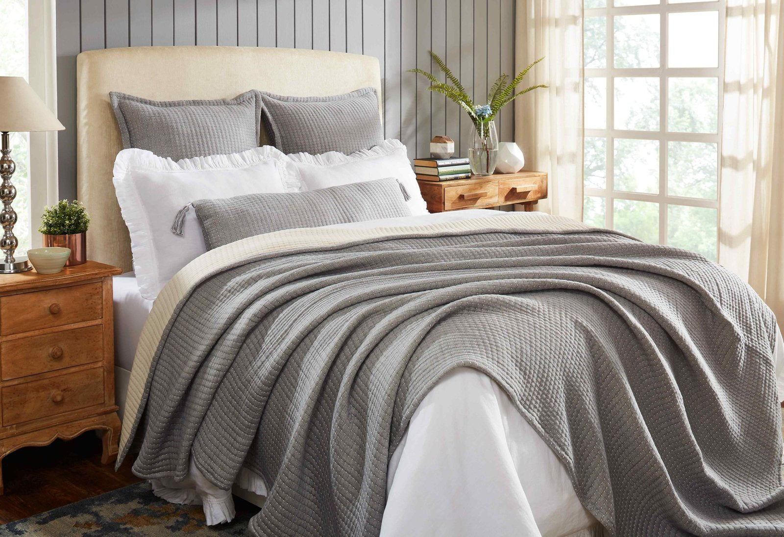 BT-108-9496_4|Elegant grey ribbed blanket draped on a cozy bed, adding texture and warmth to a modern bedroom design.
