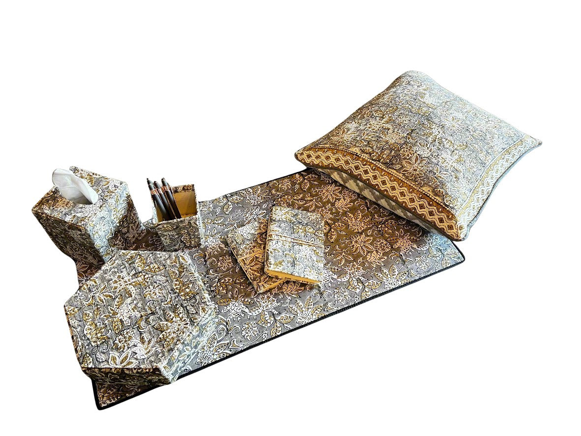 Complete 8-piece office decor set in a matching green floral block print pattern on a desk.