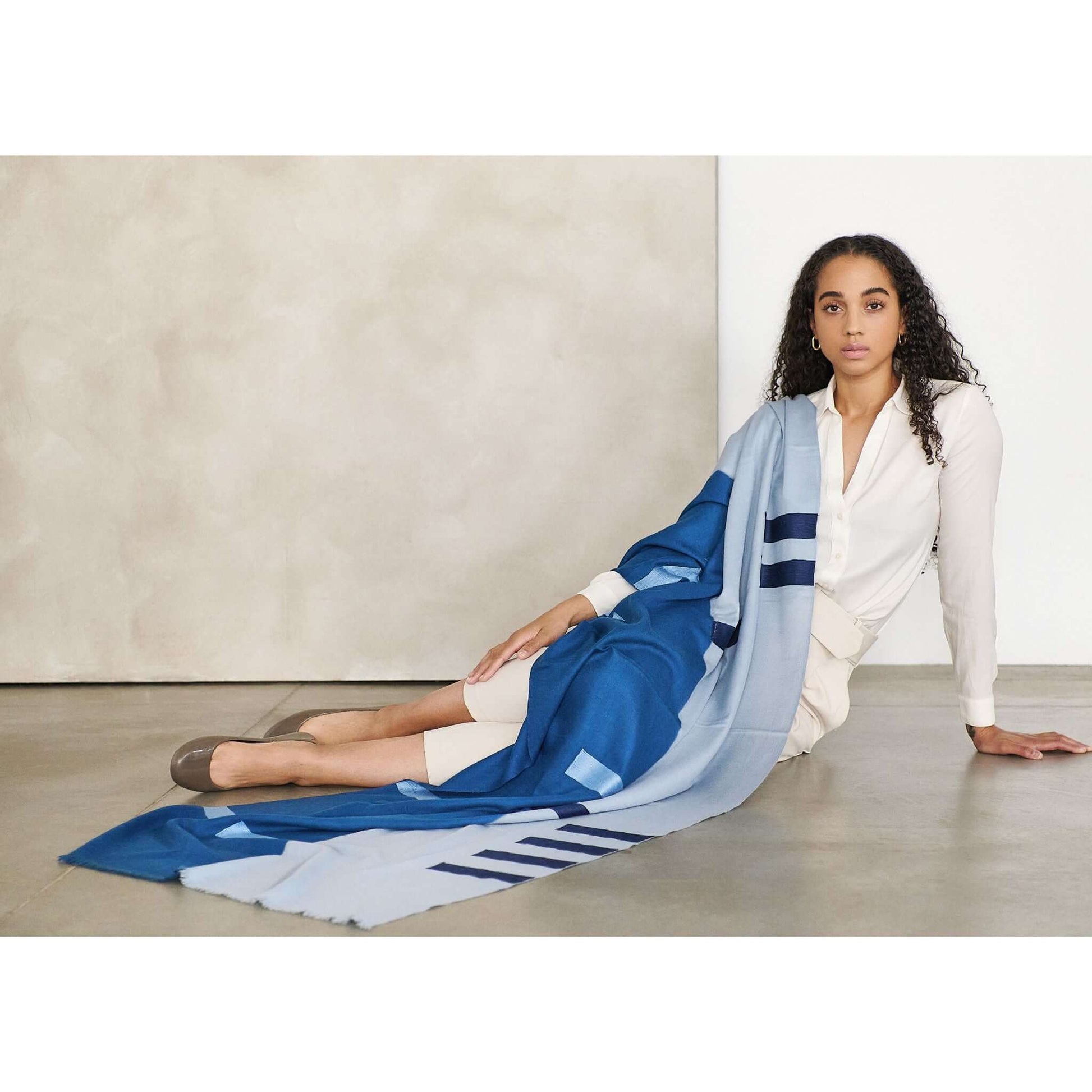 Harbor Blue Silk Merino Hand Woven Hand Embroidered Modern Artisanal Scarf styled elegantly on a model.