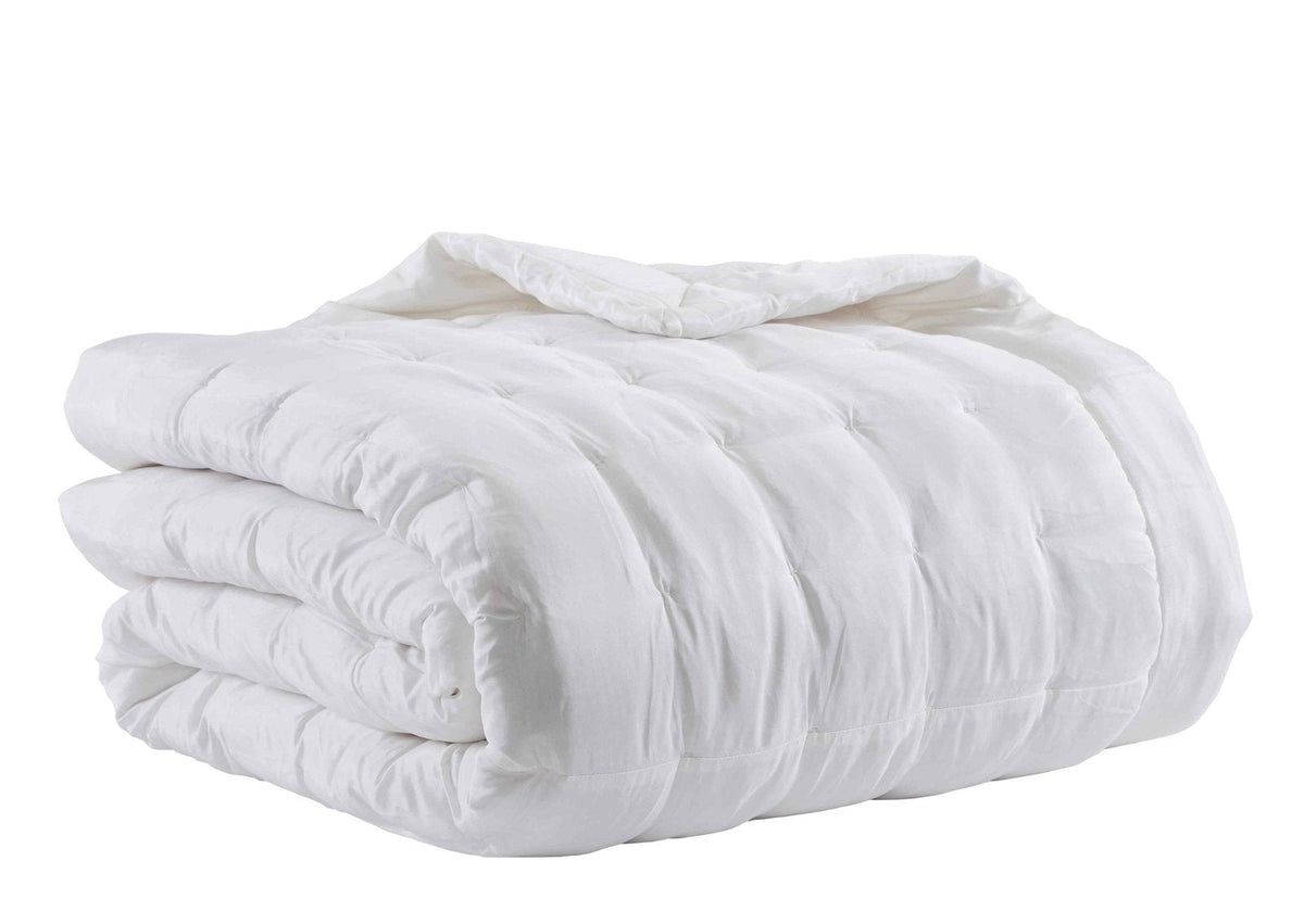 QT-332-X_2|Soft white quilted duvet, neatly folded, featuring a cozy textured square pattern. Essential, comfortable bedding.