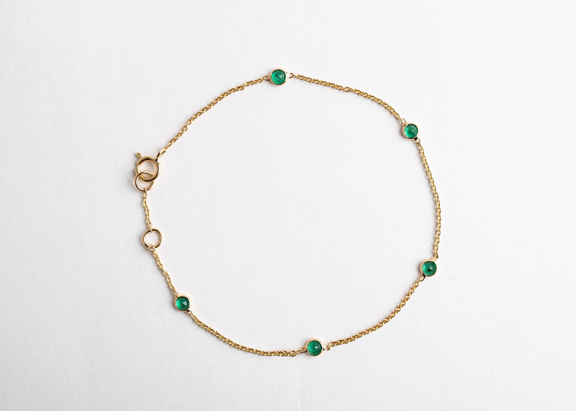Emerald Spark (small) minimal everyday fine jewelry in solid gold and sterling 925 silver with natural gemstones.