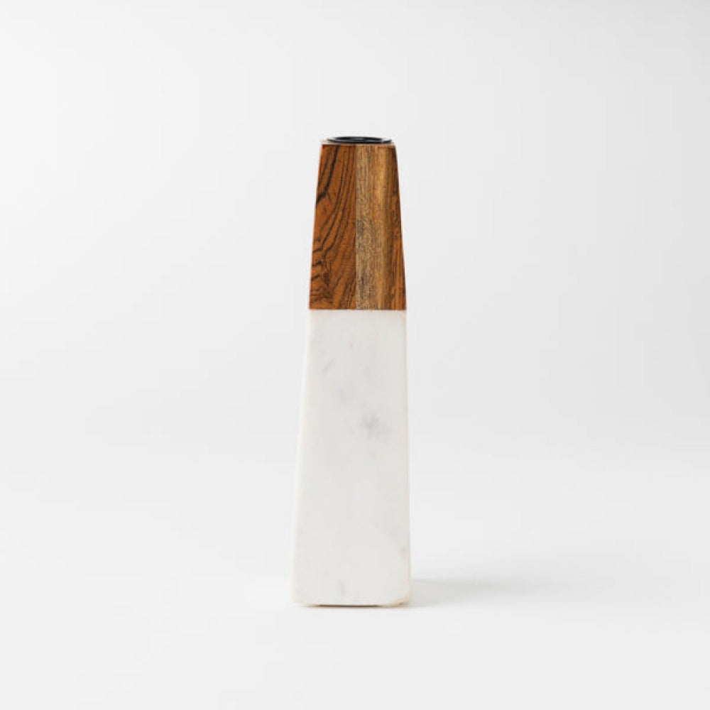 close-up of marble and wood contrast on candleholder

