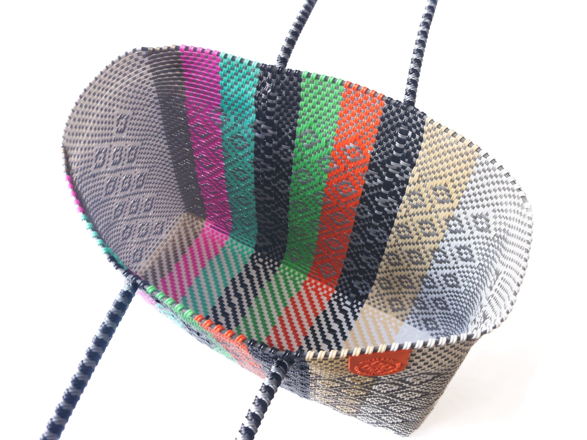 Inside look Tin Marin super tote in Maya Design, A Multicolored striped oversized tote bag with a shoulder strap.