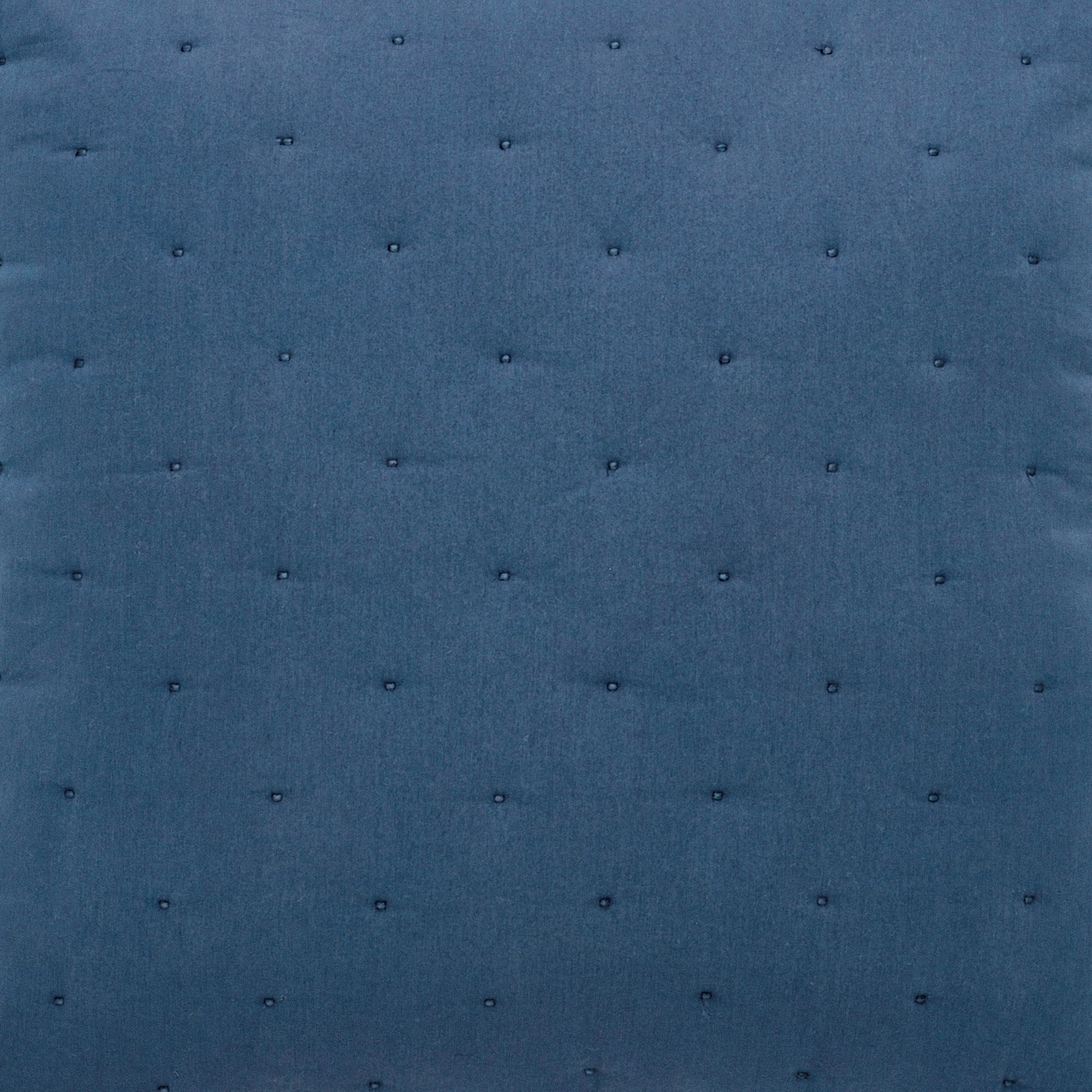 ES-357-2626_2|Rich dark blue quilted fabric featuring a subtle tufted grid pattern, ideal for luxurious and cozy home furnishings.